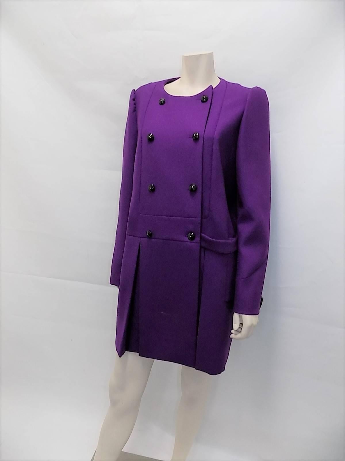 Collection fall winter 2011 beautiful wool  New With Tags Yves Saint Laurent Purple  Coat featurinf double breasted closure With  cone shaped  Leather Buttons, Two front deep pleats and half drop belt detail. Very stylish and chic! 
Size 46

Bust