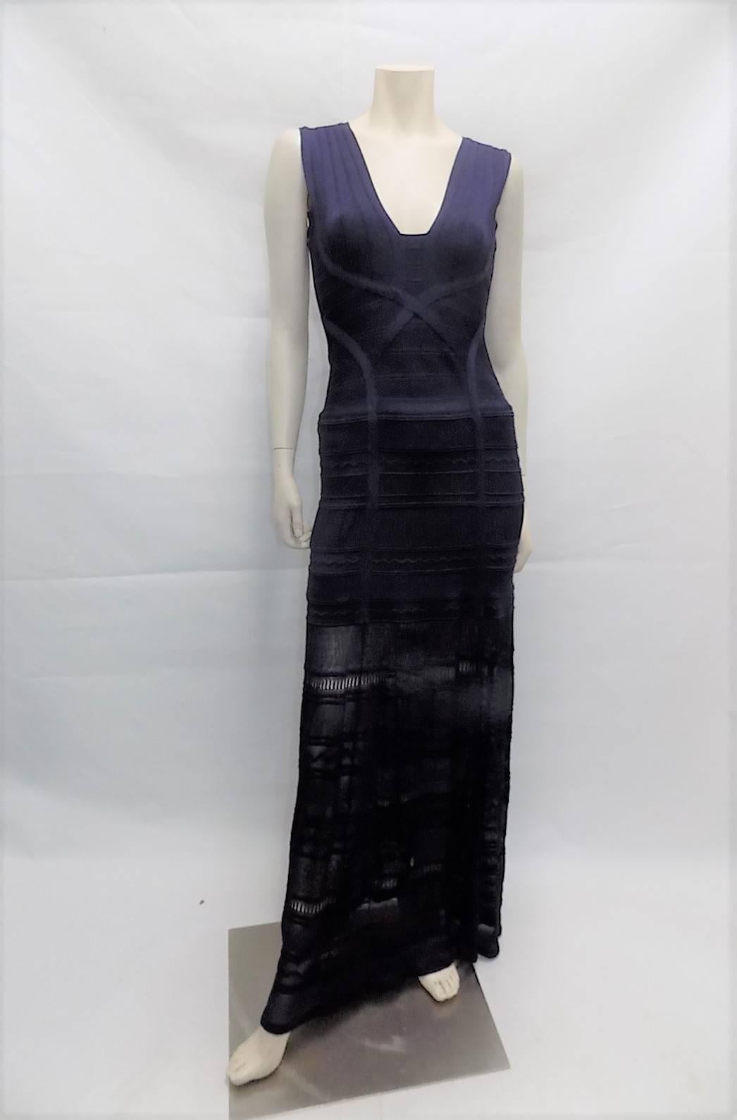 Elevate your eveningwear with this modern design. The banded bodice features deep neckline while pointelle-stitched panels lend a fluid finish to the bandage skirt. Deep  navy blue color. Pristine condition. Size Medium

    Concealed back zipper