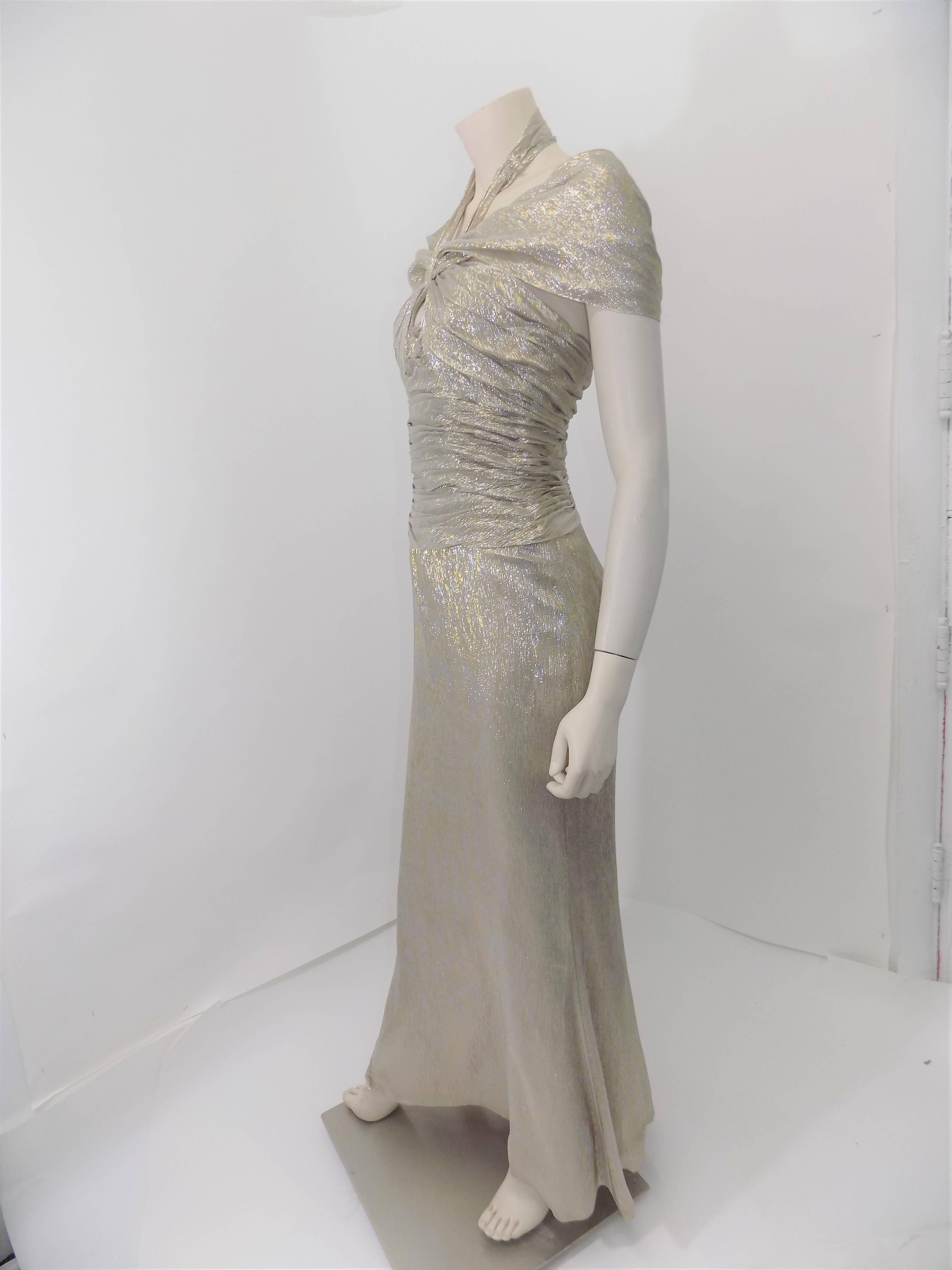 Oscar de la Renta's gown is made from lustrous gold silk-blend with a tactile crinkled finish. Worn once in fabulous condition.Wear it with minimal jewelry to your next event.
Gold silk-blend
- Concealed hook and zip fastening at back
- 73% silk,