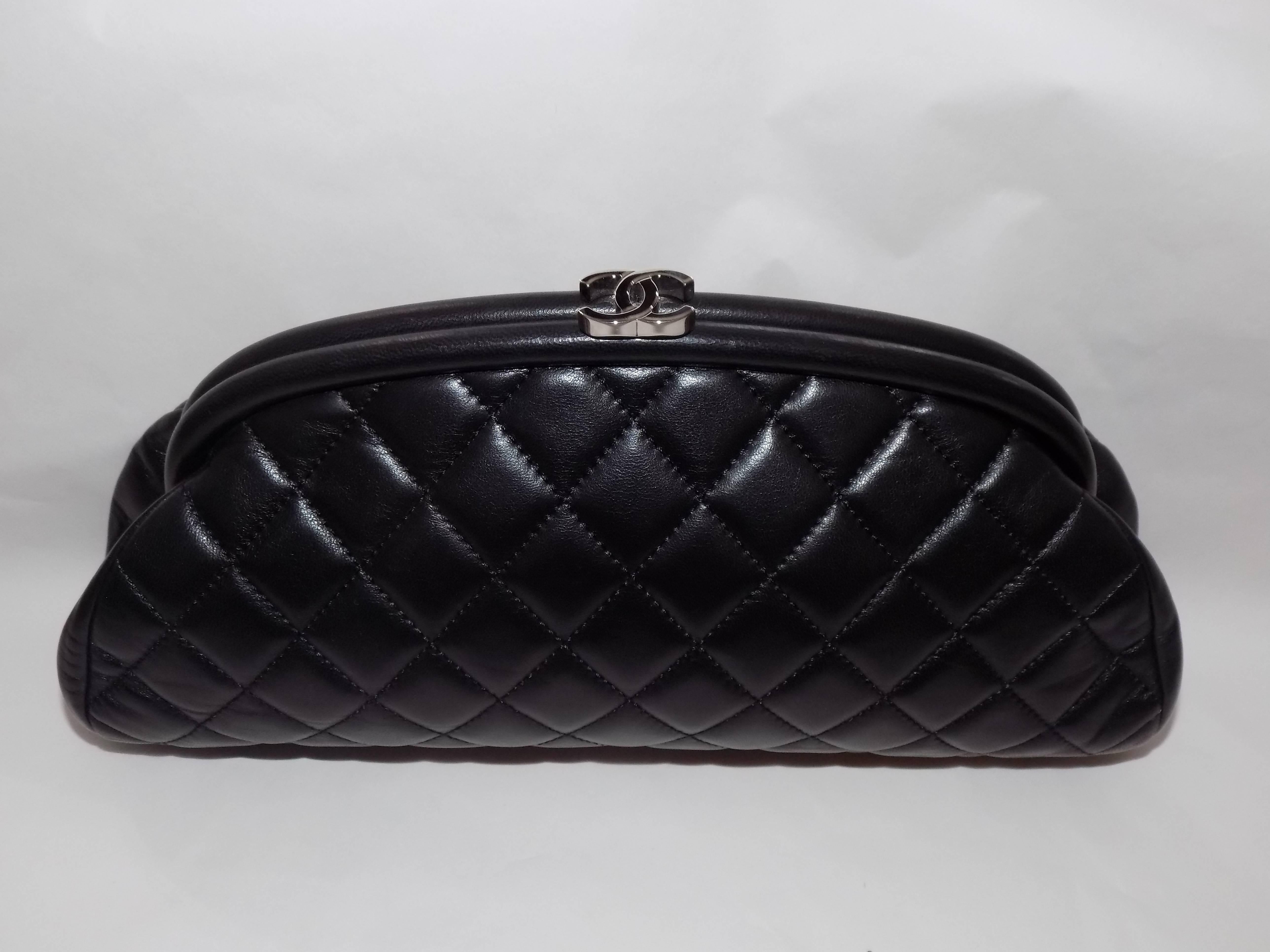 Black supple lamb leather Chanel Timeless clutch with silver-tone hardware, tonal leather lining, single zip pocket at interior wall and CC push-lock closure at top. Serial number Includes dust bag . Like new without any signs of wear
Height: