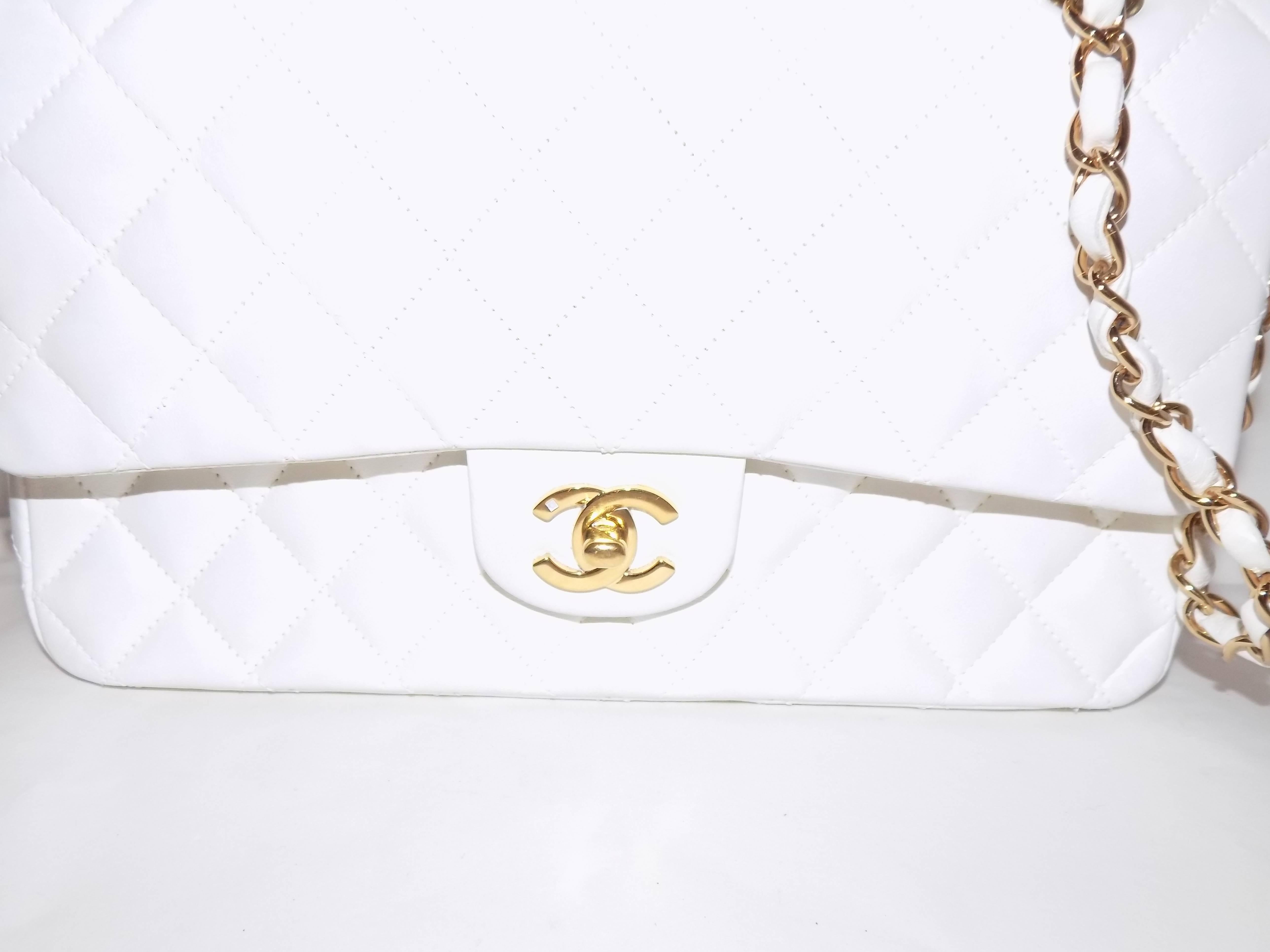 Chanel Classic Flap medium calf leather and gold  hardware in AMAZING condition. No obvious sign of scratches or marks, shape stands strong, soft and quilts plumped. Hardware shiny and new. Double flap. Dust bag included. Perfect for summer. 