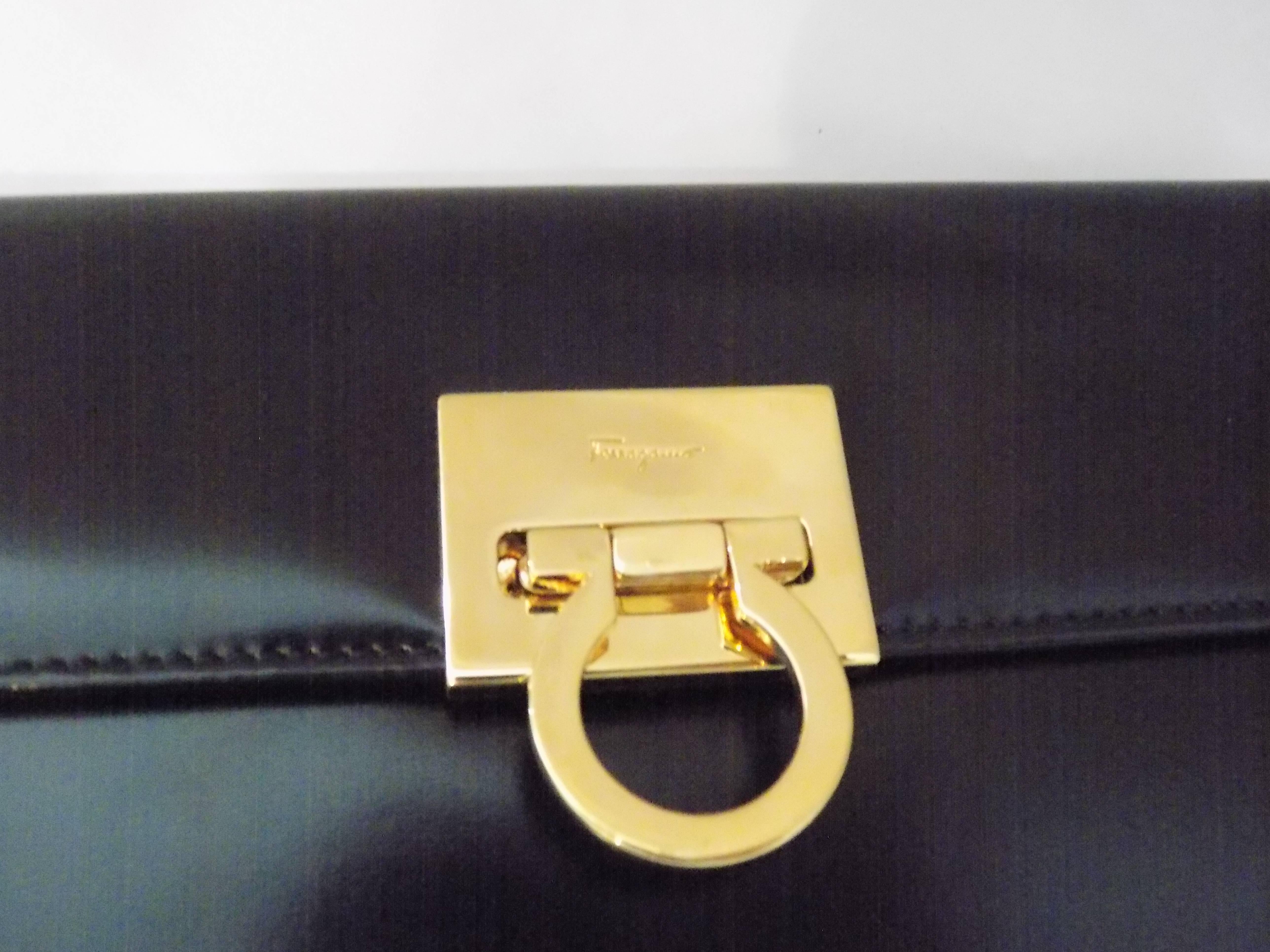 Women's  Salvatore Ferragamo black polished clutch / shoulder bag w gold chain