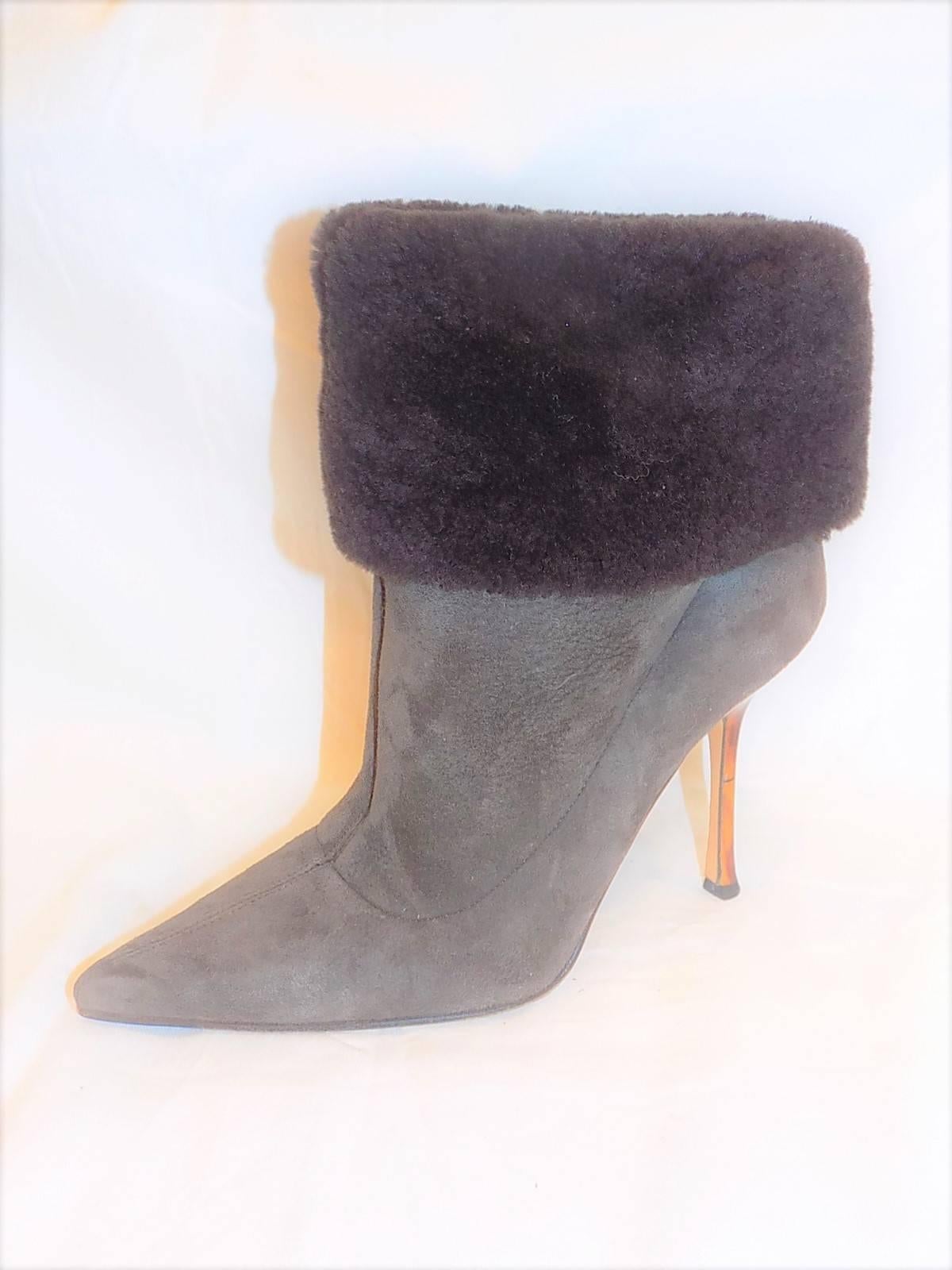 Very chic Jimmy Choo ankle suede shearling boots . Grey- ish brown color suede  pointy toe with natural shearing. . Lucite heel  sz 39. Excellent condition. Pre-owned and gently worn. 