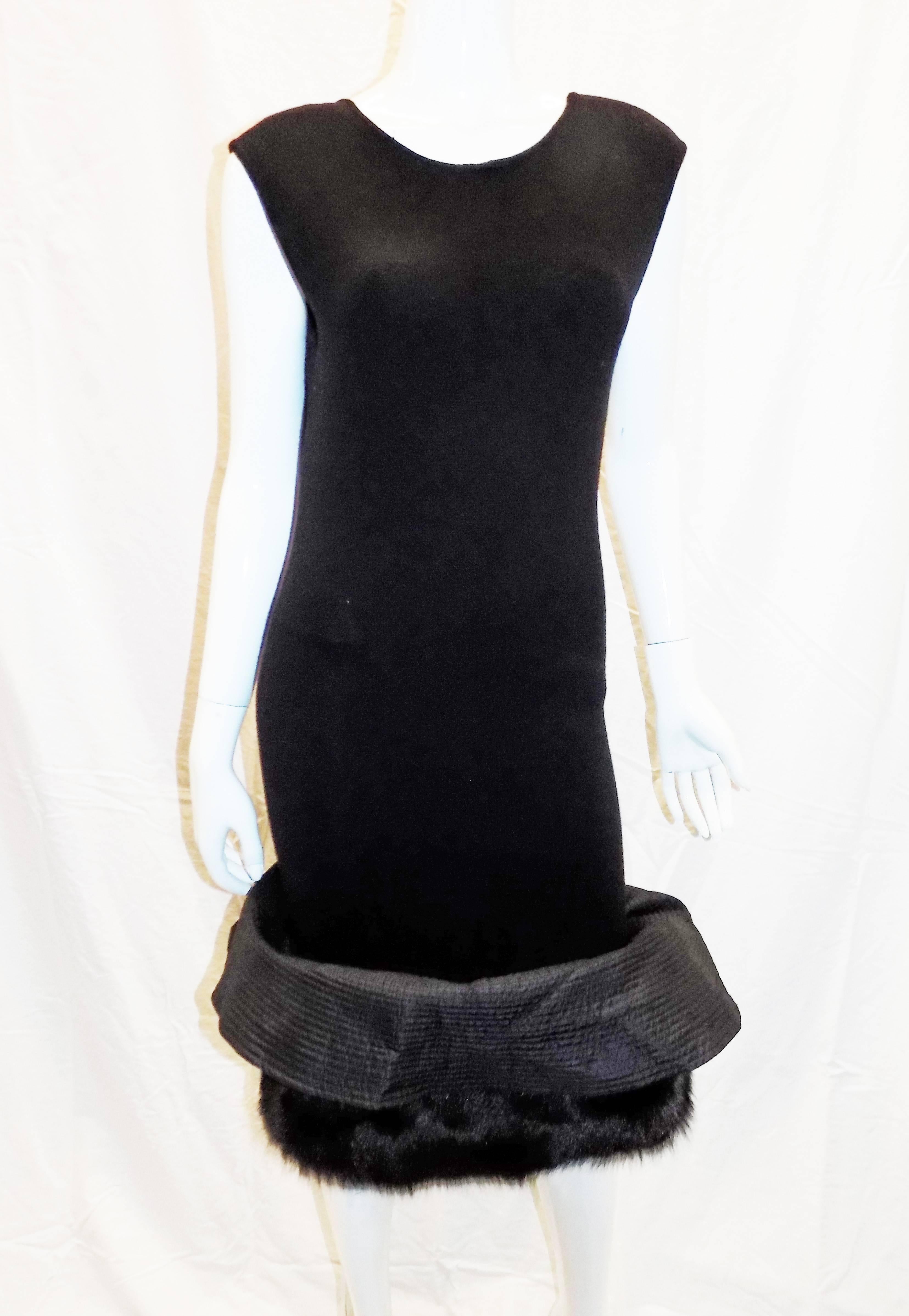 Stunning Gianfranco Ferre Vintage black knit cocktail dress . Wool knot bodice with deep U back opening. Bottom of the dress has very Rich black fox trim with top stitch silk overlay that could be  arranged different ways. Dress is absolutely