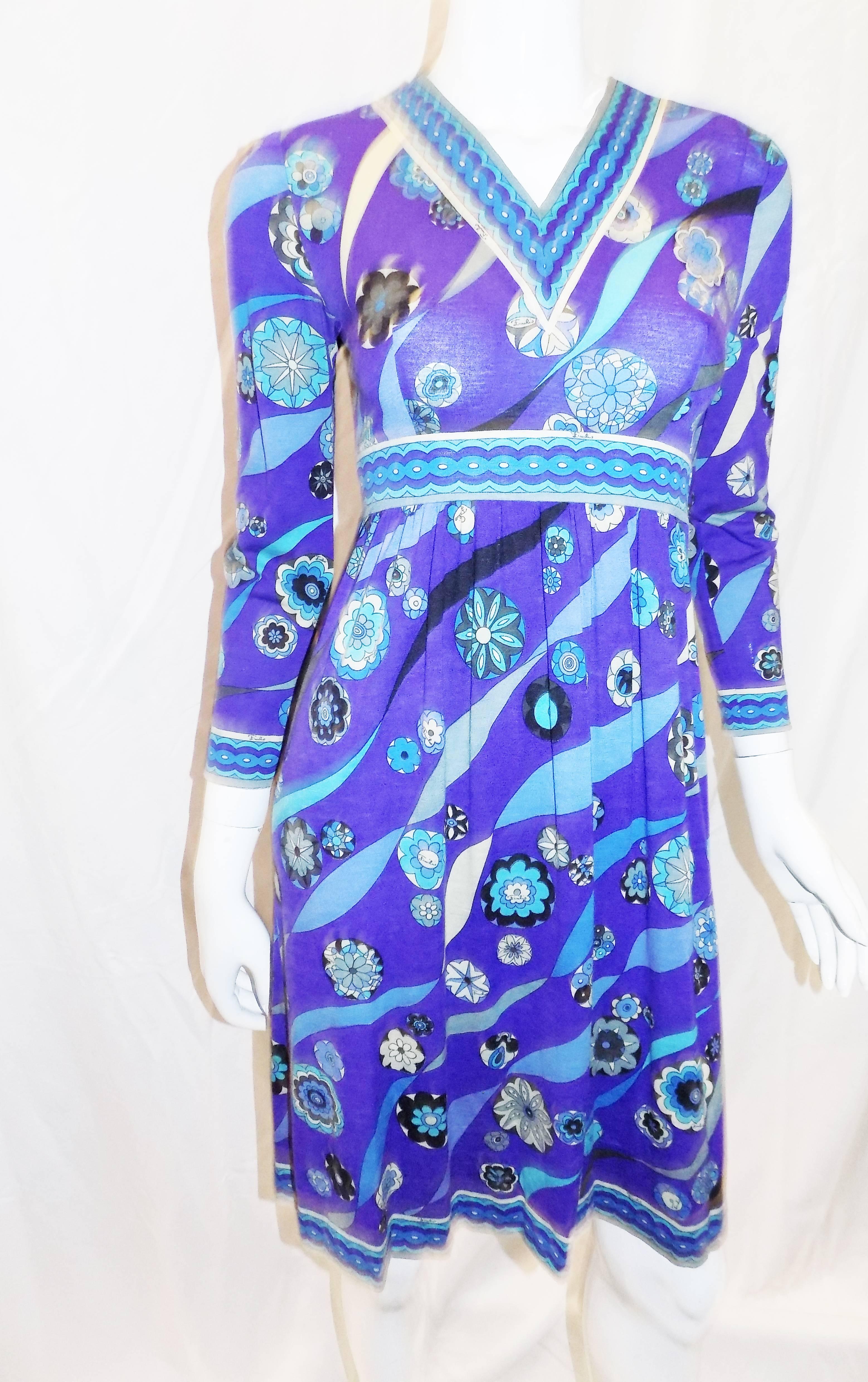 Beautiful vintage PUCCI blue print empire cut  wool and silk dress 1970. Very light blend of wool and silk in vivid blue tones and stunning print. Empire style. V neck collar. Zipper back and side closure. Pristine condition. Perfect fall, winter
