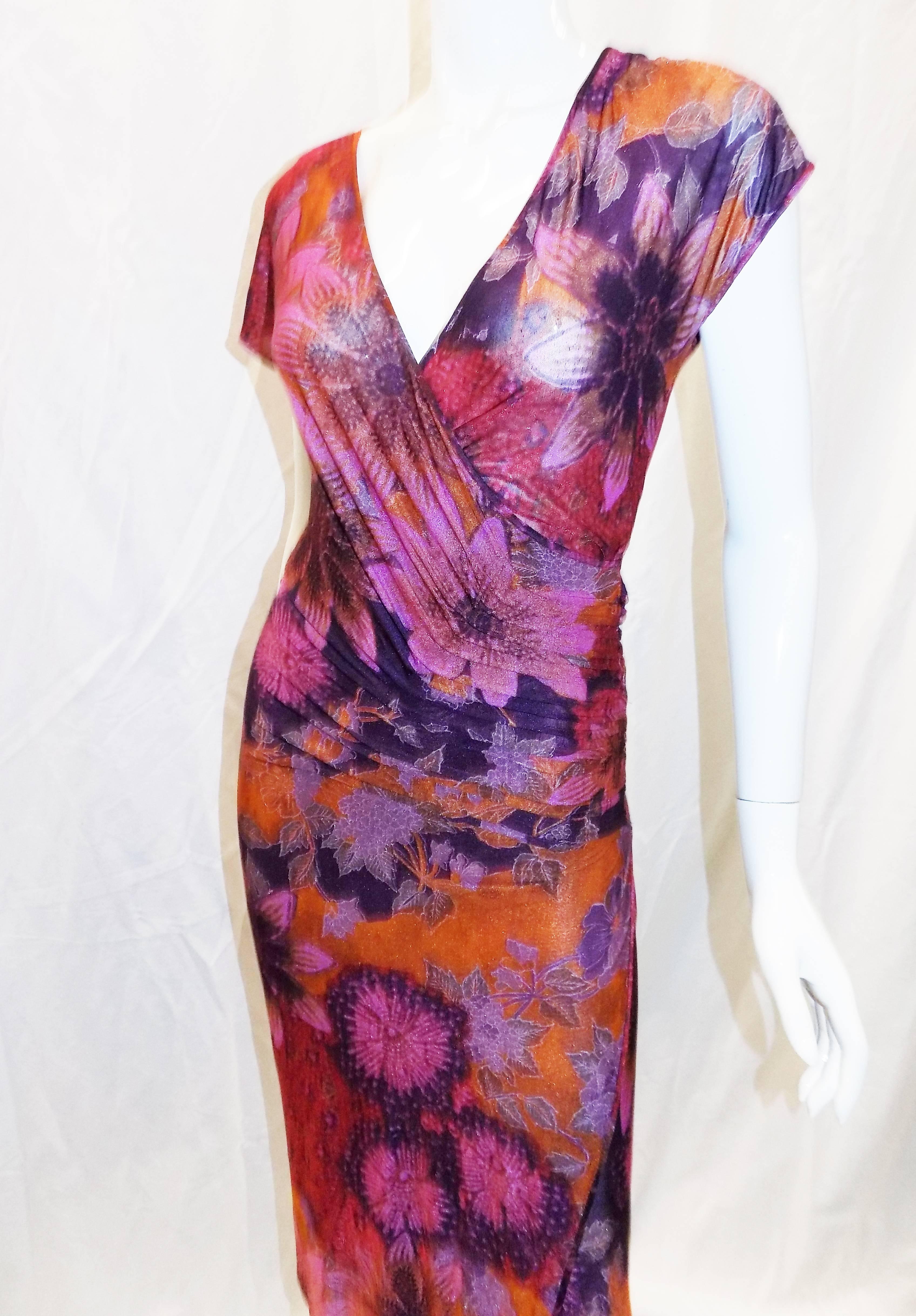 Classic jersey dress in vibrant floral print Wrap style, side zipper  and kimono sleeves.   Size  40. Viscose/elastane Dry clean Made in Italy 
Bust 36