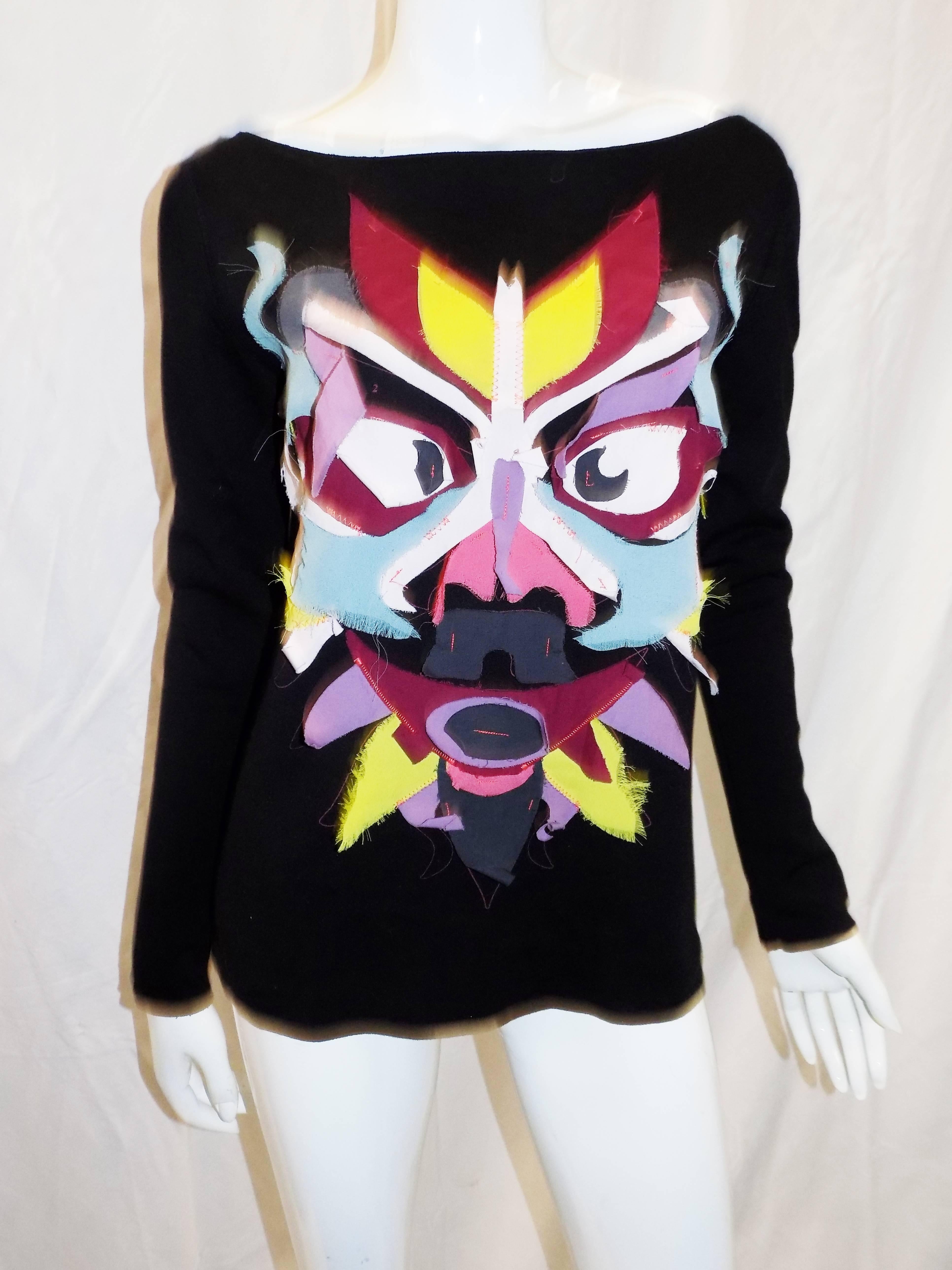 Never worn fabulous Kenzo heavy cotton blend top / sweater. Baby soft fabric, boat neckline with spectacular hand made patchwork Totem at the front. Every piece was cut  out of different fabric and sewn  to the top.  Measurements are bust 38