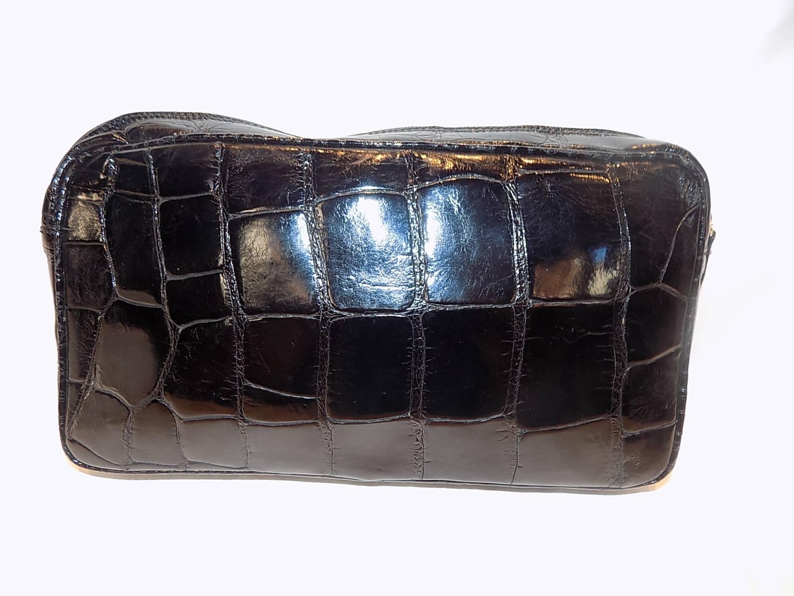 Fabulous Mauro Governa crocodile large black clutch bag Mens accessories bag . Italian craftsmanship. Brown suede lining. Zip top closure. One outer pocket. One inside zip closure pocket. . Measures 13