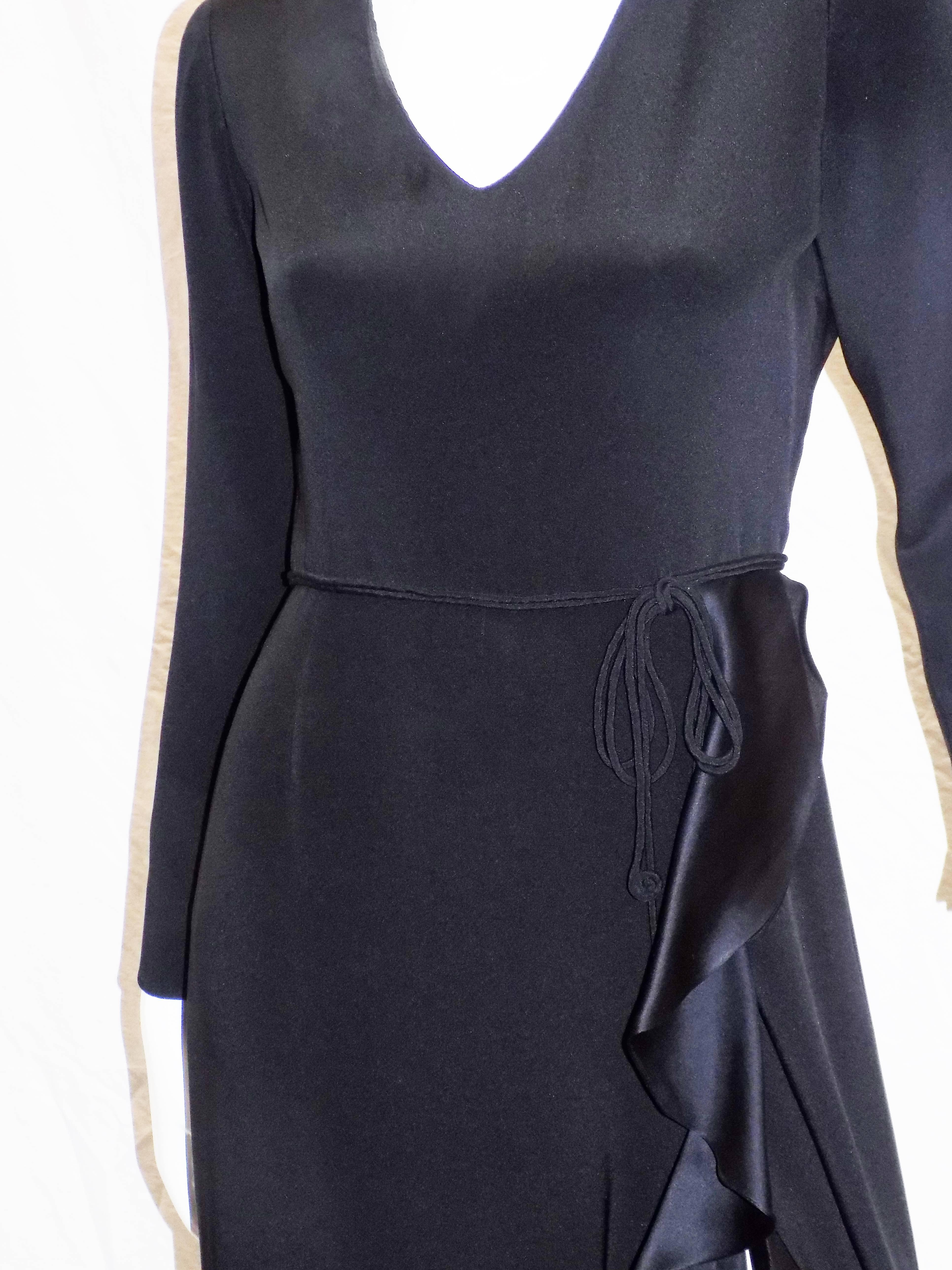 Black Carolina Herrera elegant  breathtaking   black silk long sleeves ruffled gown