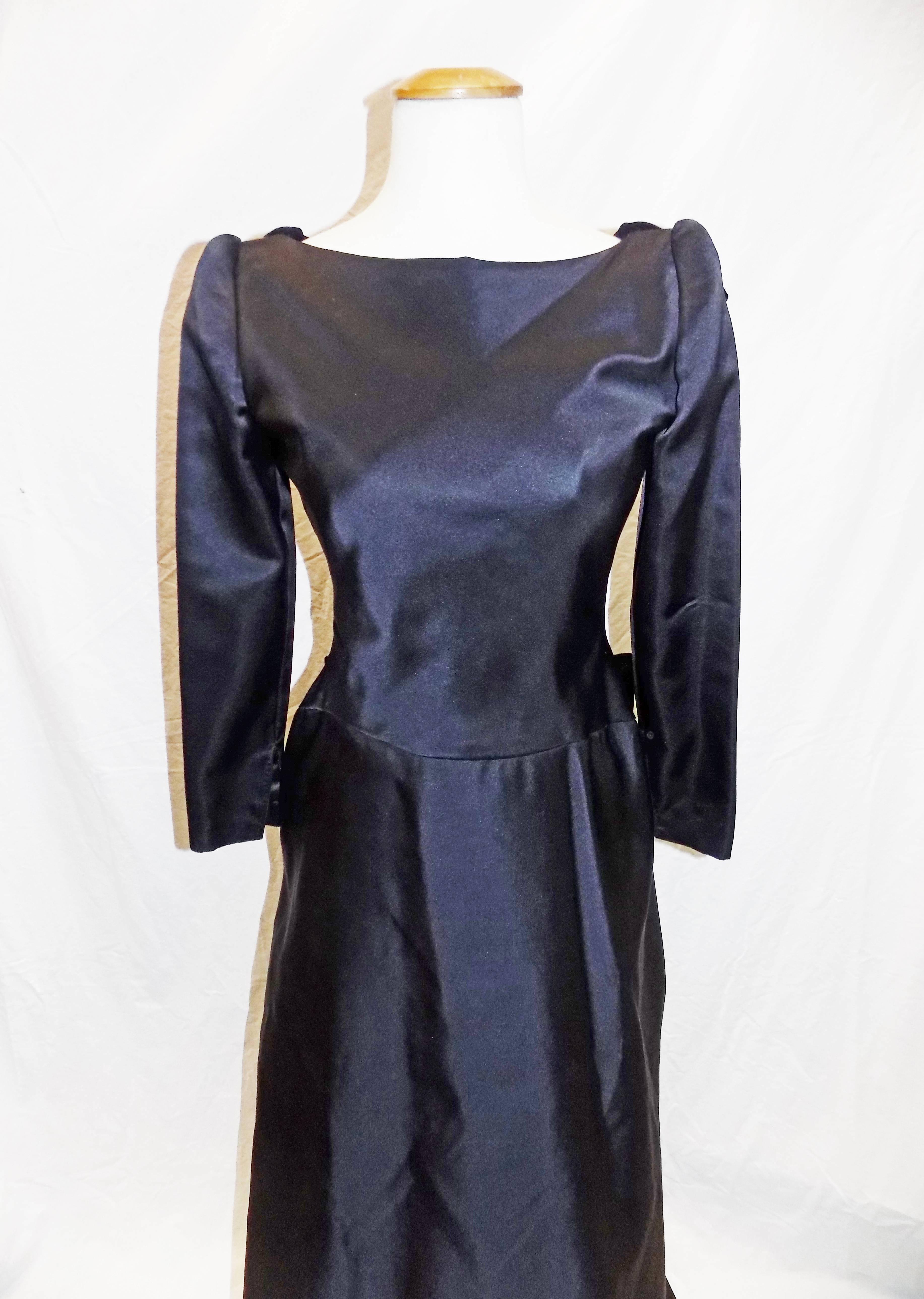 Spectacular vintage Oscar de la Renta  Black silk  satin duchess gown reminiscing 18 century. Gown features deep V back with wired 