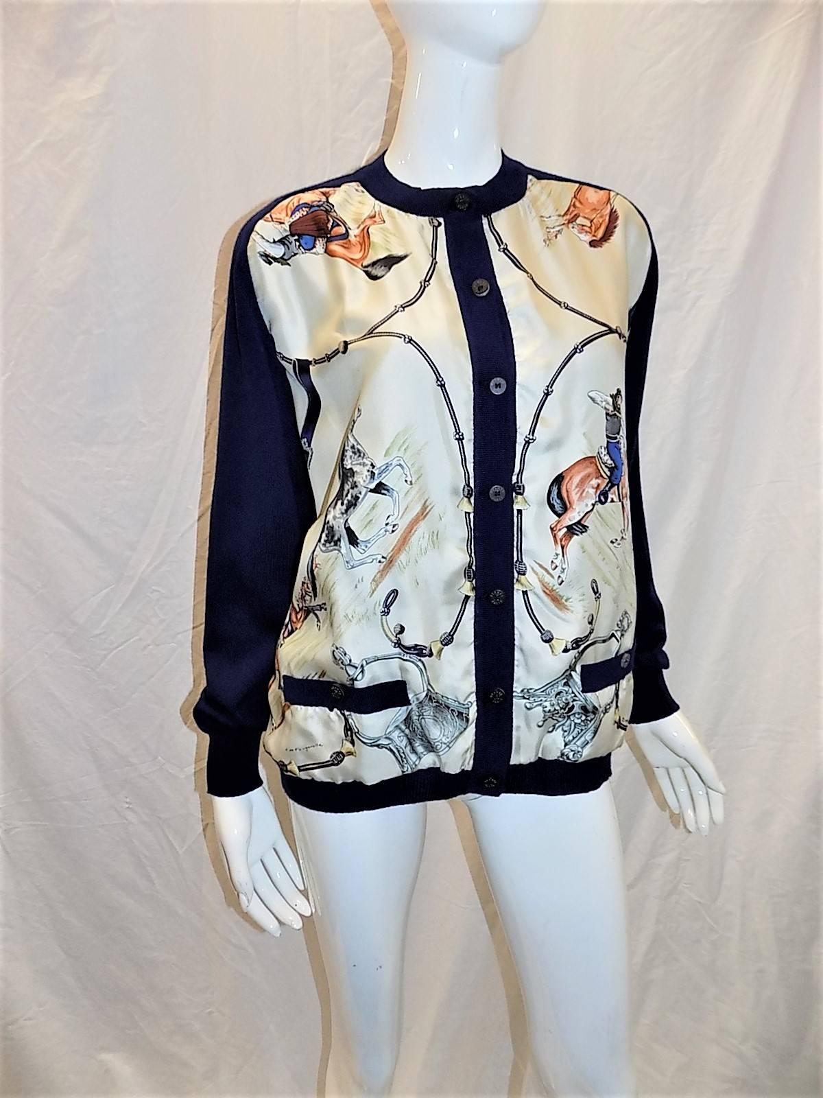 Navy Hermes vintage equestrian cardigan sweater by artist  J De Fougerolle.  Horn engraved buttons  100% lite wool and 100% silk . Size 46  bust 50