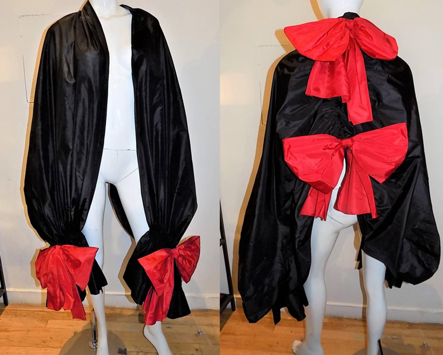Spectacular black  silk taffeta Christian Dior Vintage oversized  evening shawl wrap with  red large bows. True one of a kind piece. Pristine condition. 