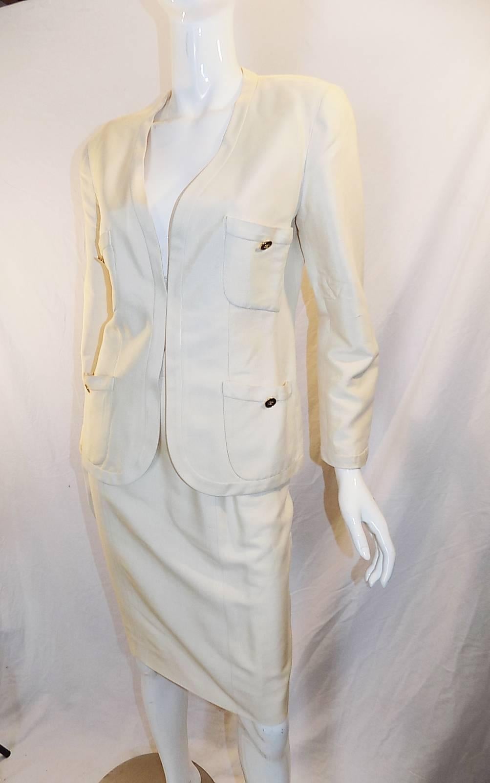 Perfect summer Chanel suit. Shantung silk.  Both pieces are great to be worn separately. Suit is very versatile. It looks extremely elegant worn as is with little blouse or camisole or separately. Jacket could be paired up with jeans or just about