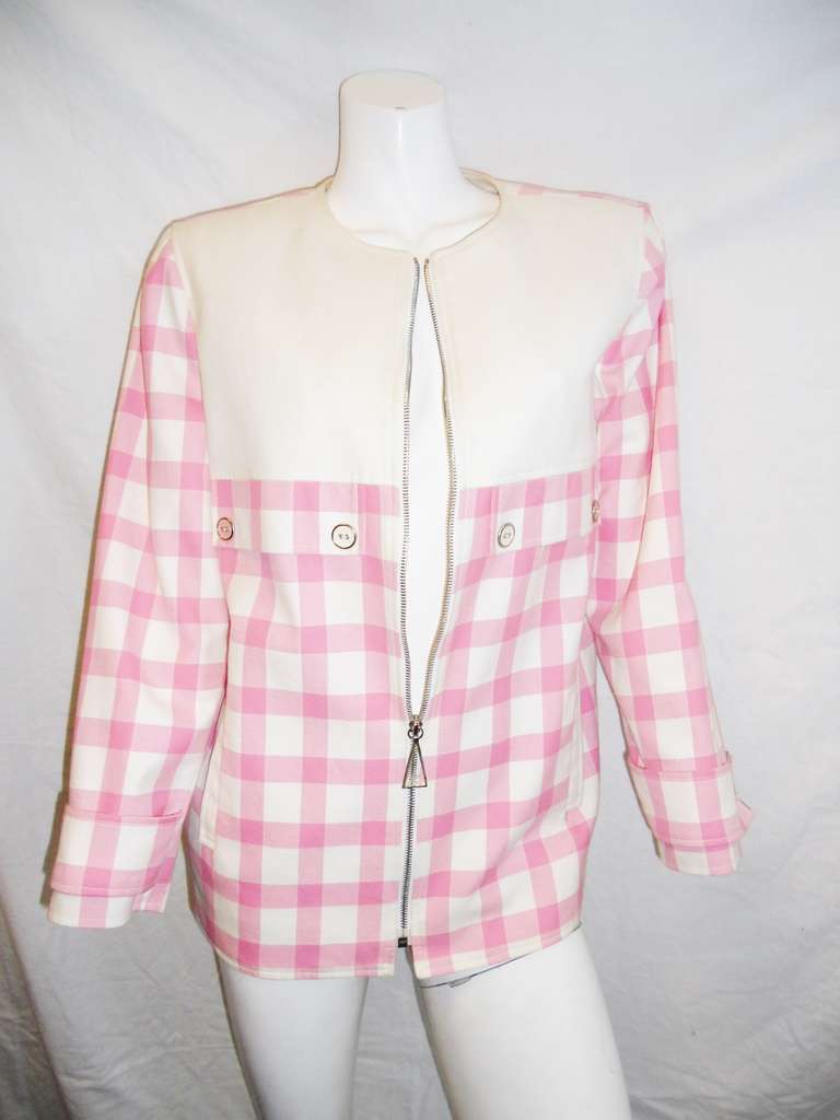 Courreges  pink checkered spring summer zippered jacket. pristine condition. brushed cotton. Triangle zipper pull with logo.  Silver rim Lucite buttons.fully lined. Size 36. 
Bust 40" length 27" sleeves 22"