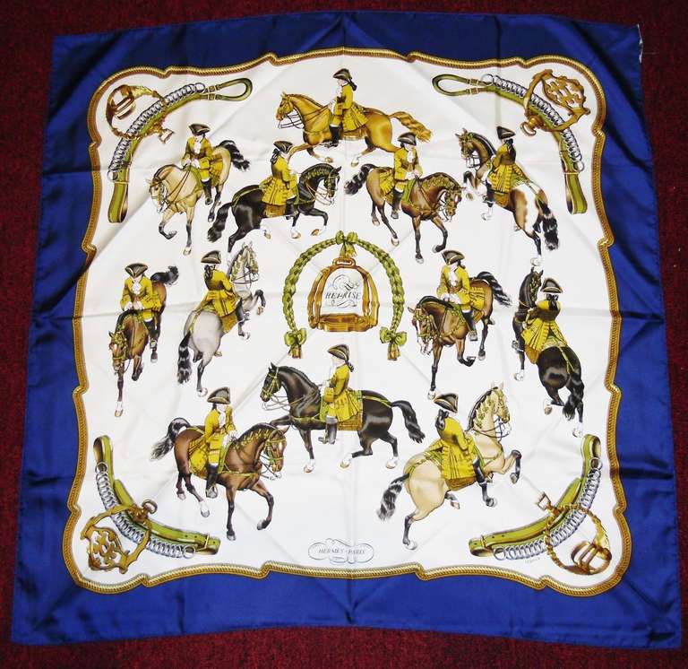 Fabulous 1970's  first issue  HERMES Square
Silk Scarf REPRISE by Phillipe Ledoux !!!
Made of fine silk twill in brilliant colors navy blue border , white background .
100% twill silk.
Hand rolled edges.Stitched edges.
The scarf is in great