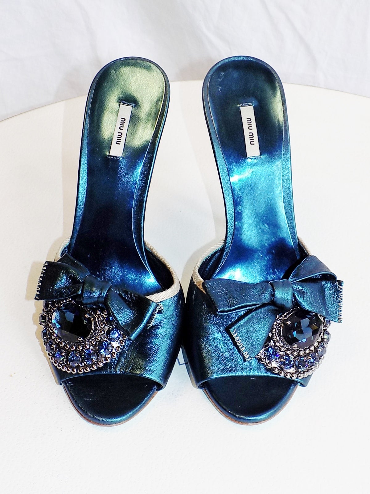 So cute and so super  sexy!! . Very soft leather. . Heel 5 Inches.Large  blue crystal jeweled shoe pin with bow.  Worn once ! pristine condition. Size 38