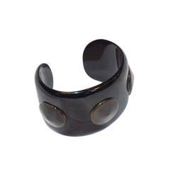 Hermes black resin cuff bracelet with ponted round discs