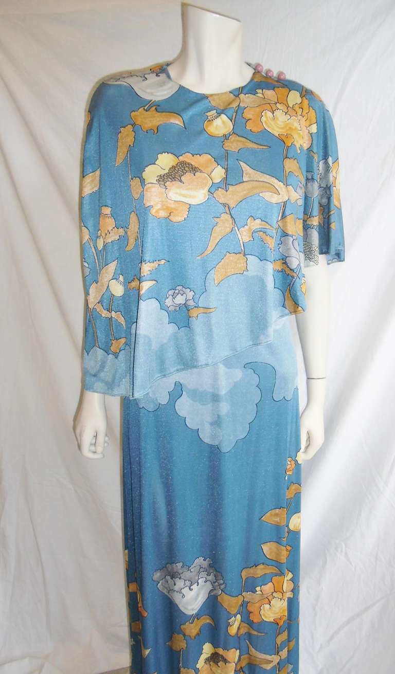 Vintage Late 1960's beautiful blue Mactac Paris for Leonard Sunshine poppy   print gypsy boho caplet maxi dress. Absolute pristine condition.  Silky Jersey. 
Leonard Sunshine was known for high-end ready-to-wear, and he was estimated to be active