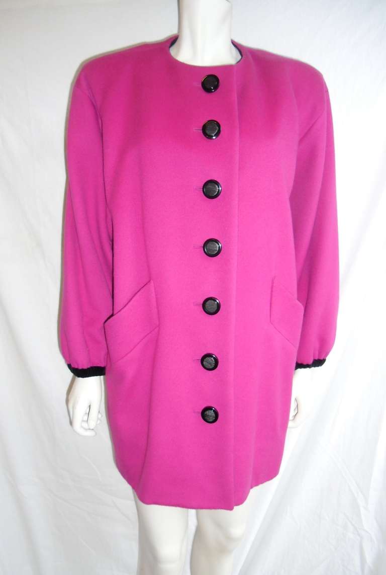 This is  classic YSL in every way! Color, style even buttons speak YSL!. So soft and beautiful.. Pristine condition!. Part velvet lined at the front button, and collar area. Also around the cuffs. The rest of the coat is lined in heavy silk satin. .