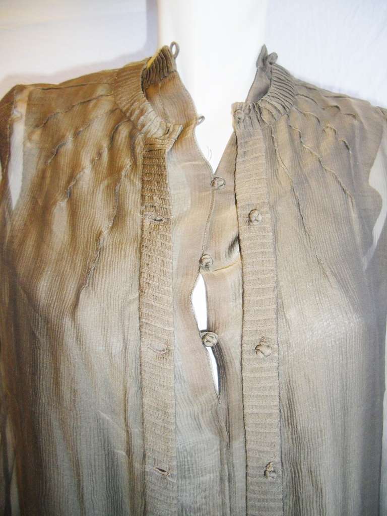 Crinkled brown  Ombre Silk Chiffon Ralph Rucci Chado Blouse and shell  Ensemble. Very delicate and elegant. Perfect for  pants and pair of heels. Hand stitch pleats  edging. Pinch stitch   details  . French knots buttons. Size 4
Bust 36