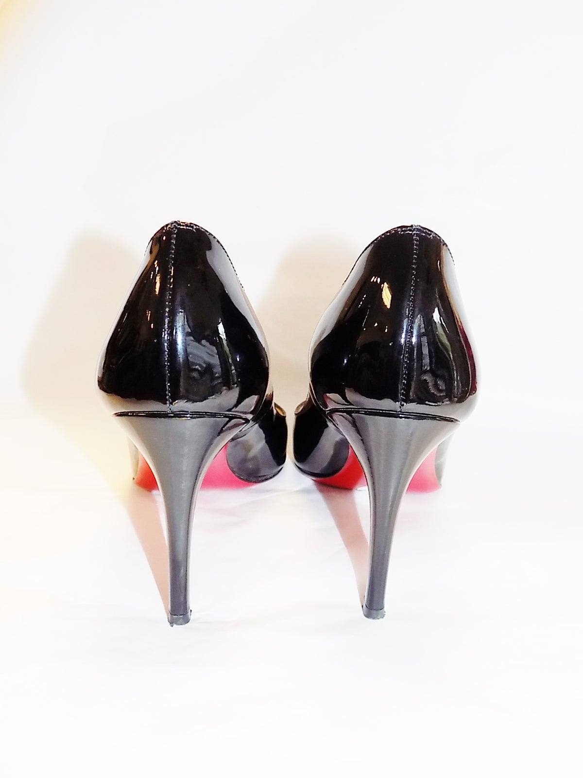Gently worn in excellent condition Christian Louboutin black simple pump patent calf leather  in sz 37 . Shipped in original box. Heel 3.5
