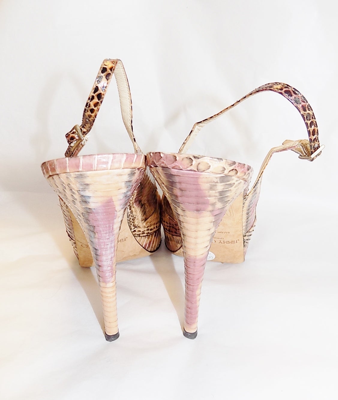 Guaranteed Authentic! Jimmy Choo blush -neutral Stiletto Peep Toe Snakeskin Pumps (Size 8.5). Neutral- blush colors  . small platform and 5 inch stiletto heel. Size 38. worn twice. Pristine condition!