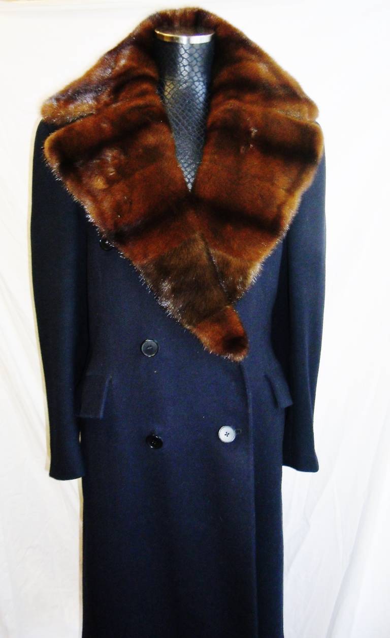 1971 Made by Dunhill Tailor in London . Herring bone navy wool. Mens coat. Pristine condition.  Sheared mink lining  and mink  collar has been completely updated . Double breasted.Coats features Side pockets, inside wallet pocket and back vent .