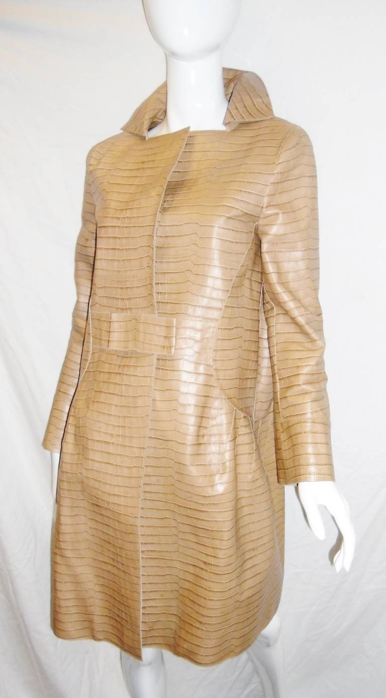 Croc-effect leather in pristine condition like new! No signs of any wear!! Beige color. Top of the line  Alberta Ferretti. Concealed snap front closure. 
Silk Lined. Size 4