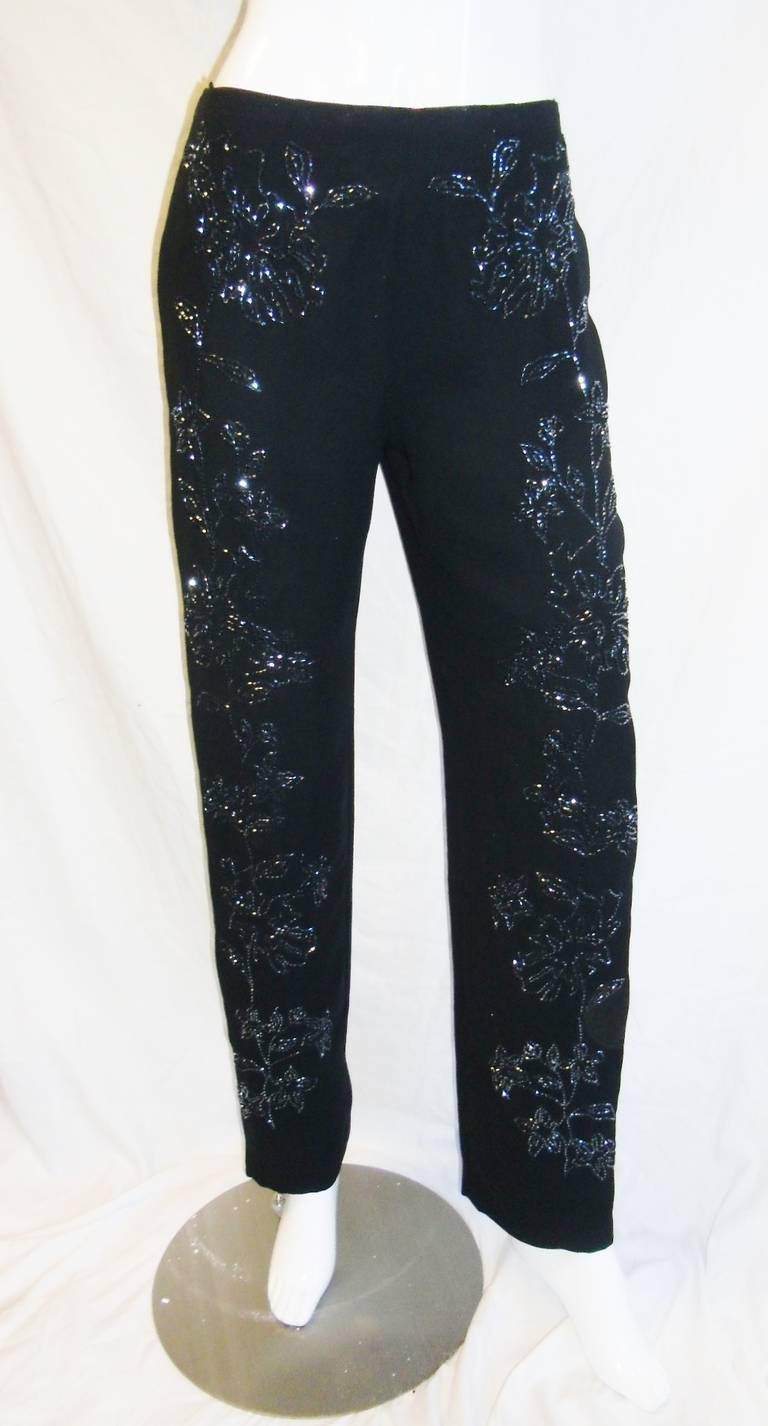 gorgeous 100% silk evening hand beaded  Pierre Balmain evening pants.  Flat front with zipper back closure. All beautify hand beaded . Lined in silk.  Pristine condition!!! size 4
Waist 26"  Hips 36"  Rise 10"  inseam 32 "  leg