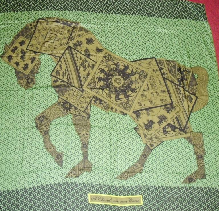 Issue  2006, Bali Barret, Equestrian Horses  New with  tags  in green New with tags “Is this a horse decorated with scarves, a figure in a cubist painting, or is the animal clad in a full coat of armor? In fact, the A Cheval Sur Mon Carré scarf is a