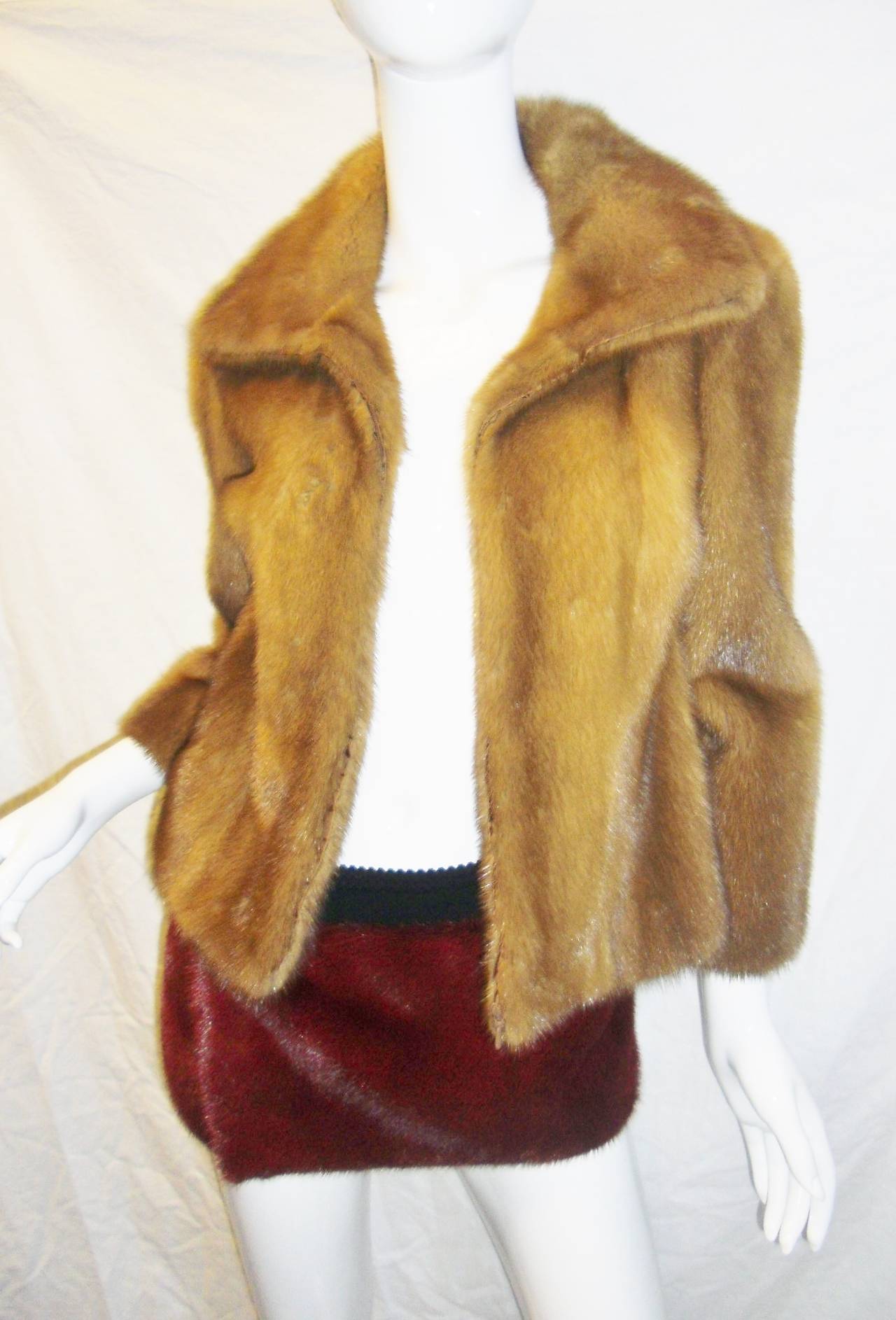 Tres Chic! Dolce & Gabbana burgundy red Mink Fur mini  wrap skirt. Perfect with leggings or opaque stockings and boots. Two inch wide elastic band , 8 inch wide  female mink fur and 40 inches long. Velcro closure.