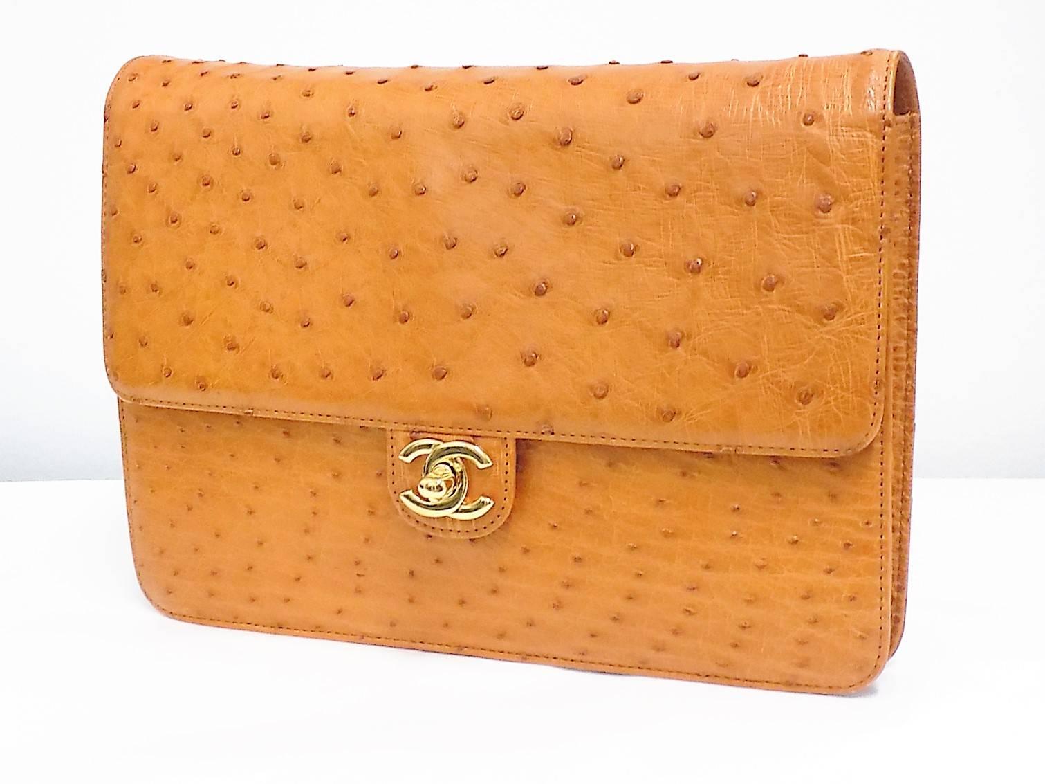 Spectacular and very rare!  1000% authenticity guaranteed in pristine condition. 
Warm cognac color flap style with classic Chanel chain that could be removed or stored in the bag hence used as a clutch.  This is one of my favorite bag so far in