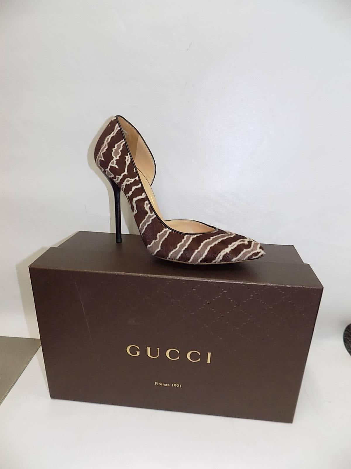 Animal-print pony hair and leather d'Orsay silhouette, finished with a point toe. Leather-covered heel, 4