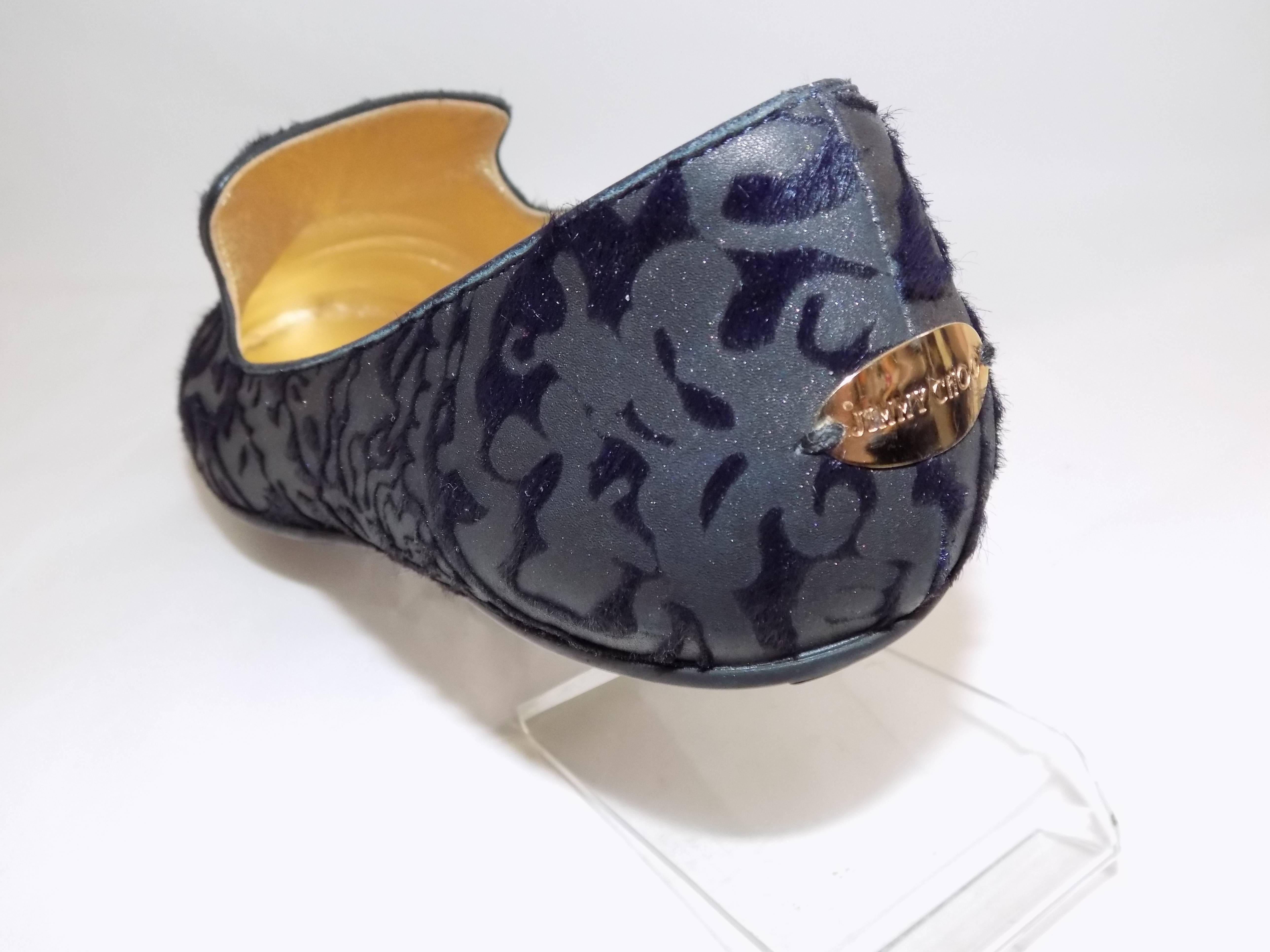 Talk about luxury shoes!!! Navy and dark bronze brocade lasered pony hair soft espadrilles by Jimmy Choo. New In box. Rare and when available there were sold out in few days. Gold Metallic leather lined. Original box Included. 