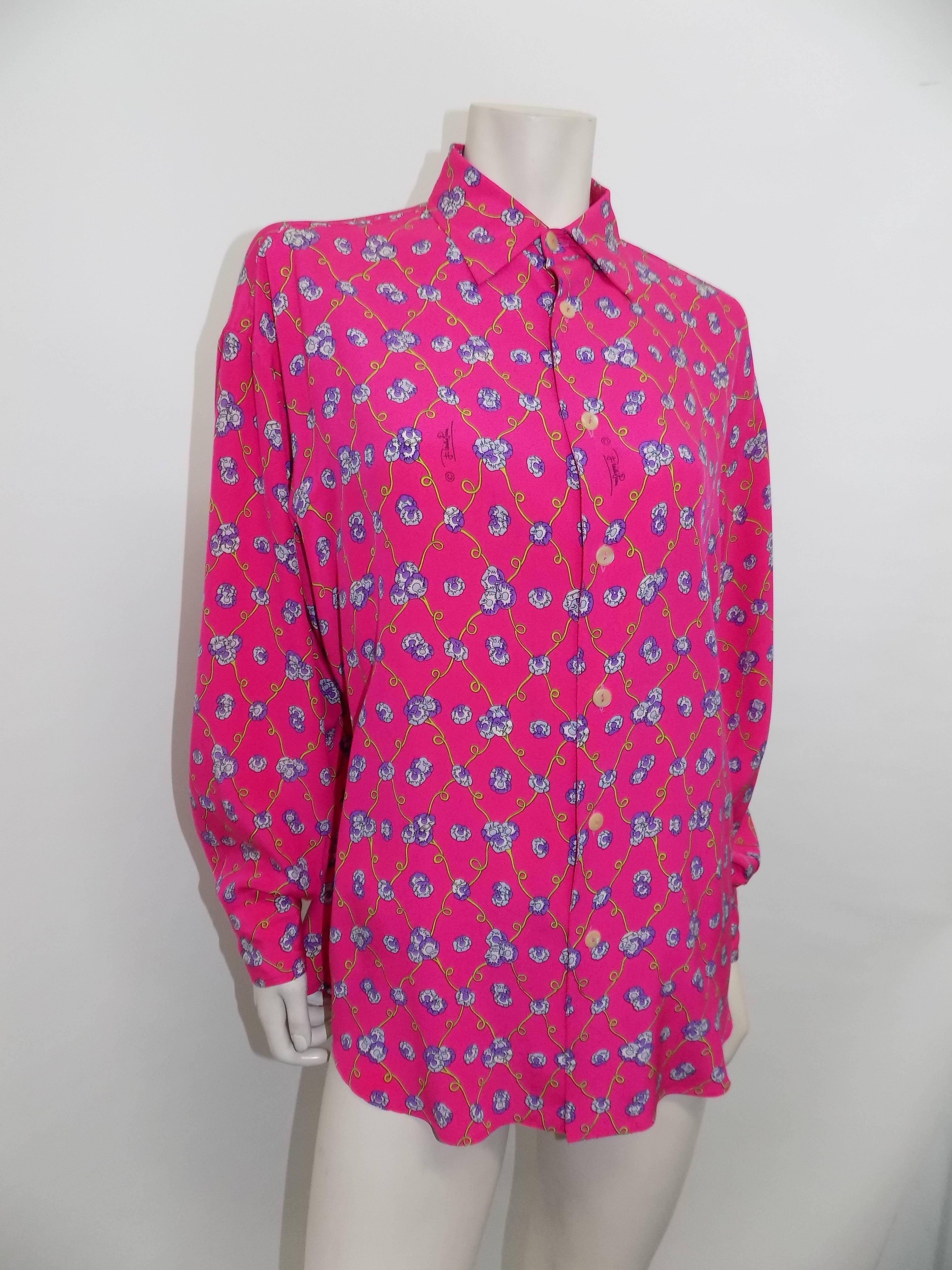 Fabulous Hot Pink with yellow and purple "orchids" flower  print. Emilio signature inside of the flower clusters. . Button front closure. Boy collar. Made in Italy. Circa 1970's. Mint condition. Great color for summer.
.Bust 48"