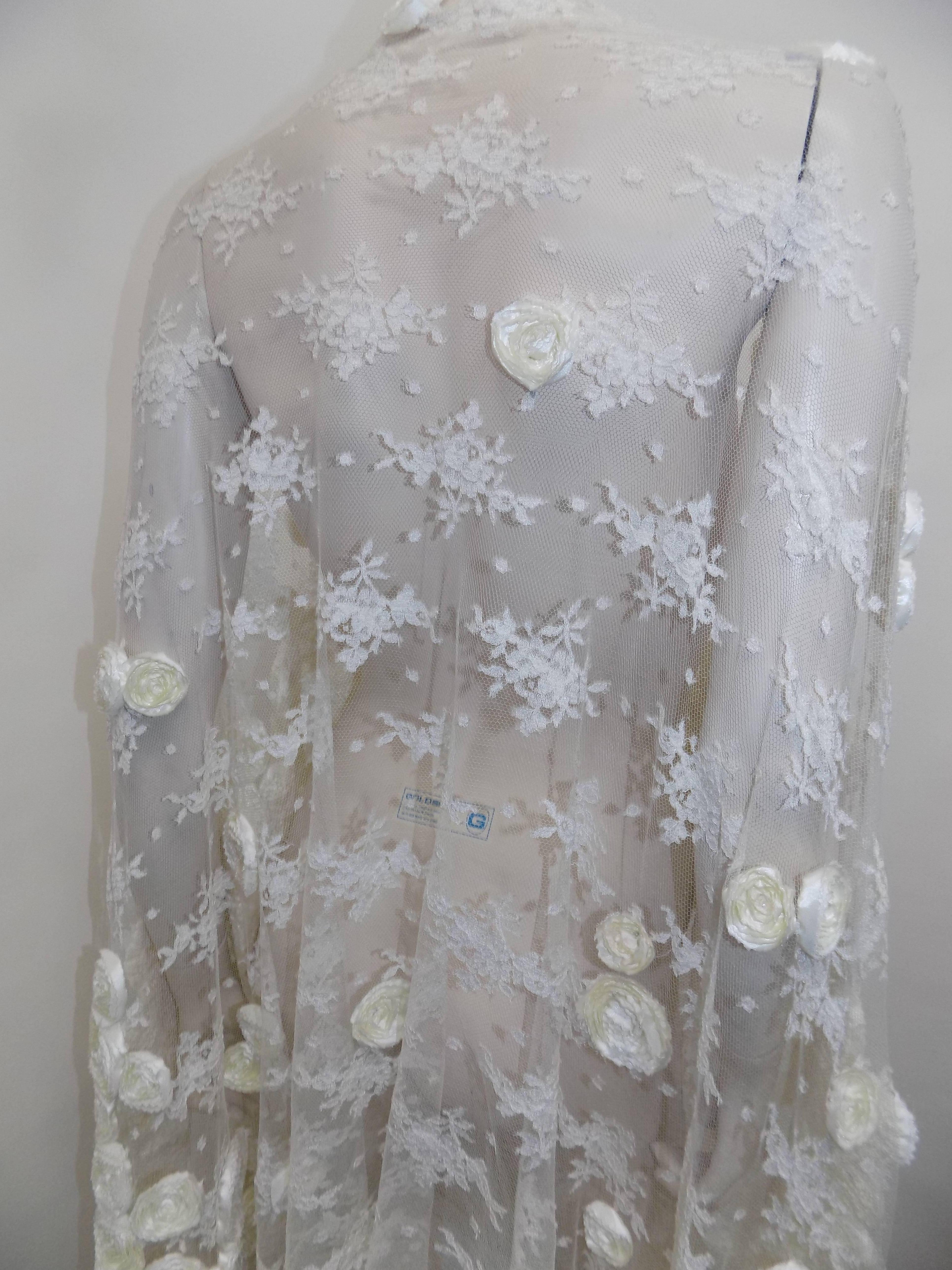 Women's Valentino New with tag  ivory Rosette  and fringes Lace Shawl / bridal