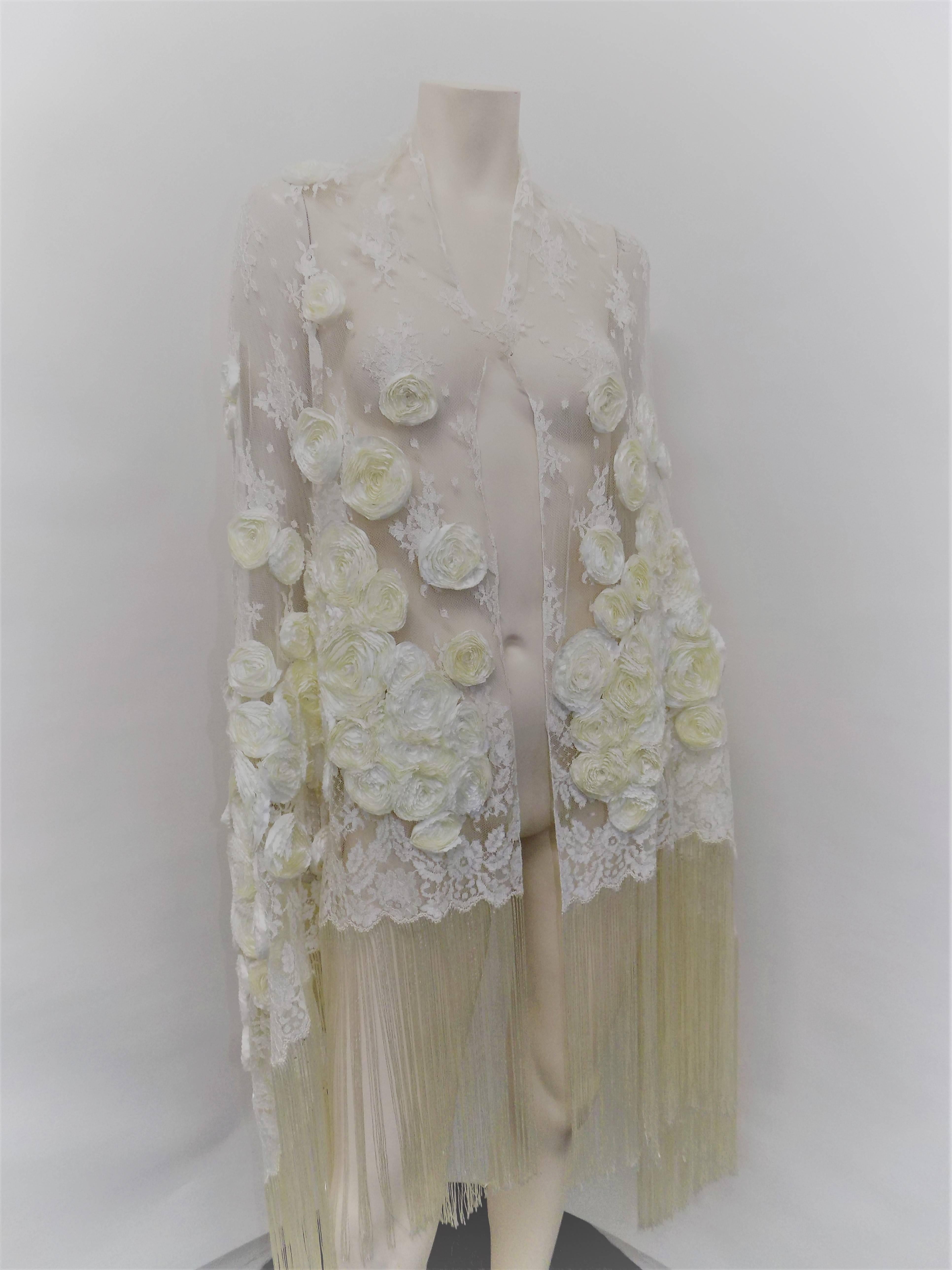 Truly incredible Valentino delicate ivory lace with hand made rosettes oversized shawl.  Breathtaking !!! measures 30