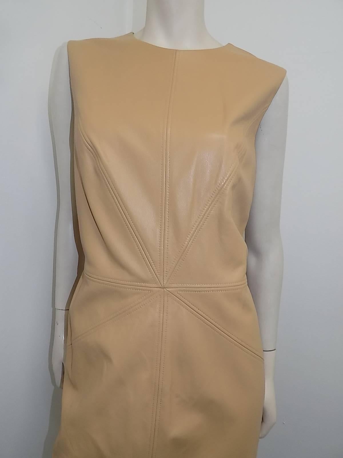 New never worn tan ESCADA Lamb leather sleeveless shift dress. Featuring top stitch, back zipper closure and fully lined. . Dress is German 42 Us 8-10 BUST 42