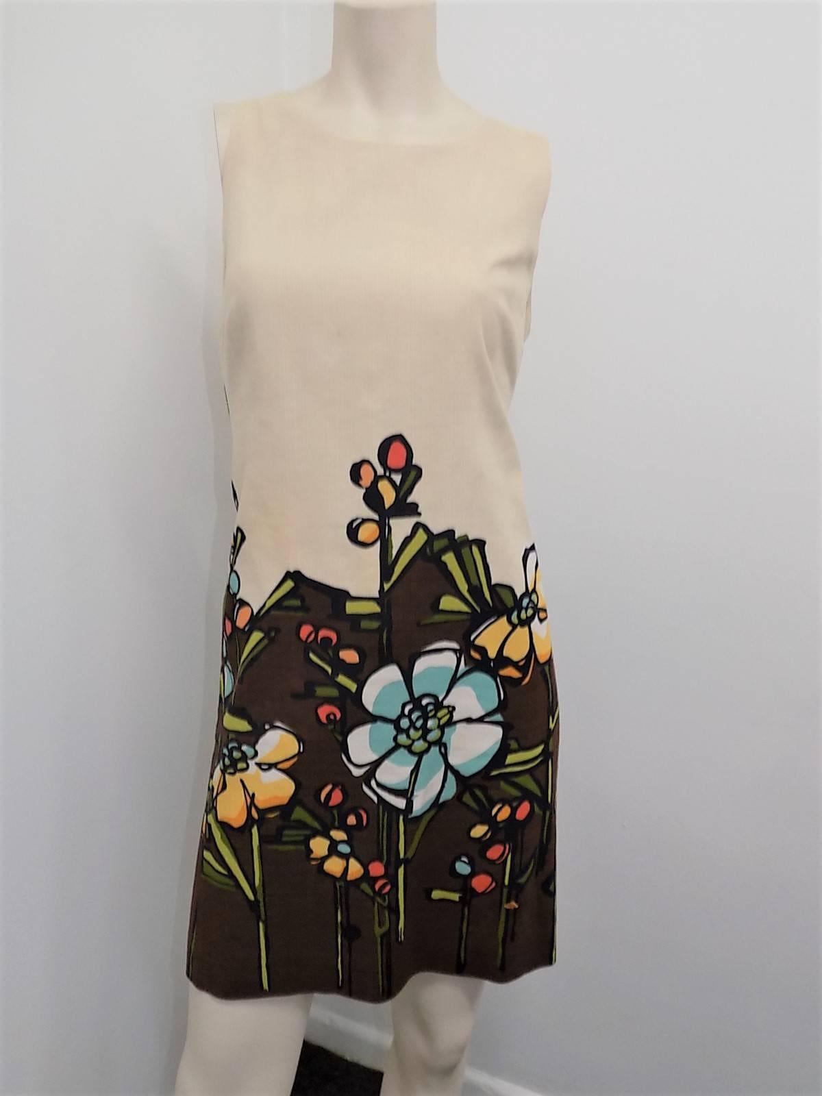 Spectacular Moschino  Cheap and Chic Rare d  Dress and Jacket Cotton  Ensemble. Inspired by 1960" fashion  sleeveless sheath dress  with cropped jacket featuring wide collar and large beige buttons. Pritn looks like colored drawings or paint. 