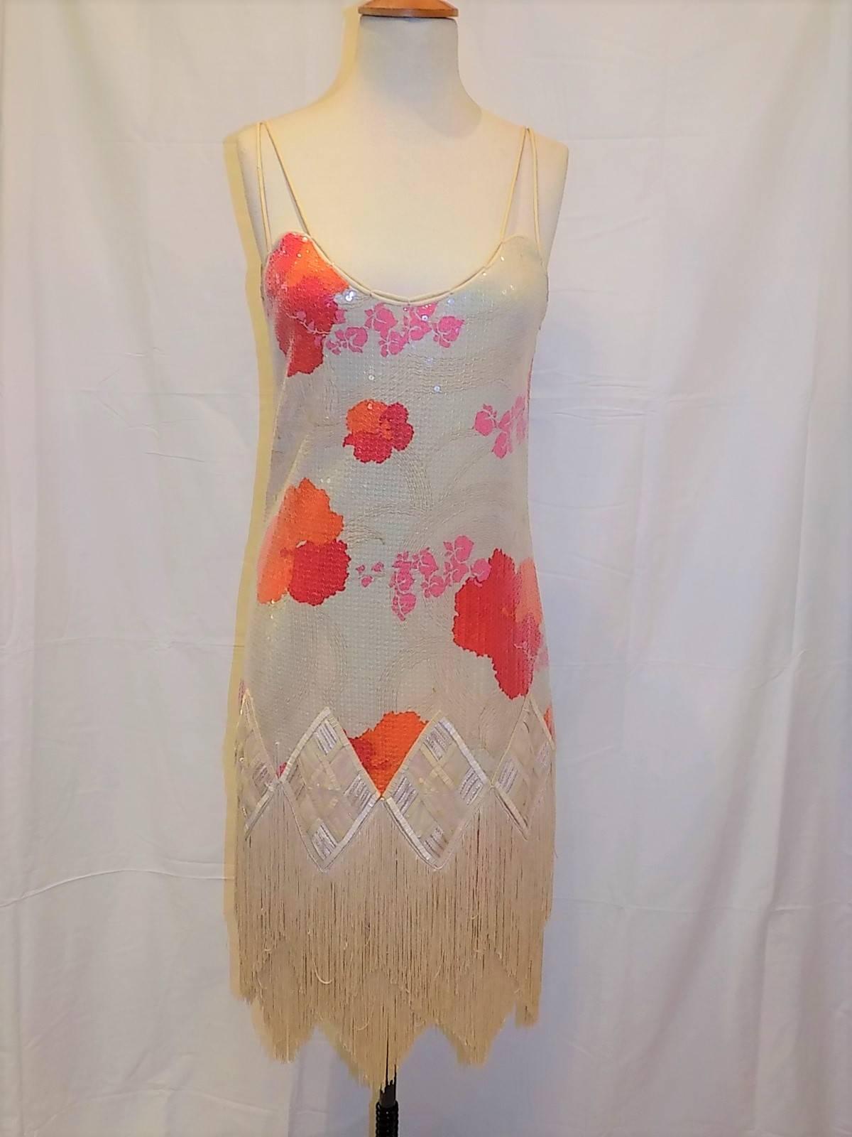 Young korean designers  amazing Runway piece.   Nude silk abstract floral print with top stotch embroidery all covered with clear sequin. . Double hand rolled shoulder straps. . Bottom of the dress is adorned with hand beaded  appliques finished