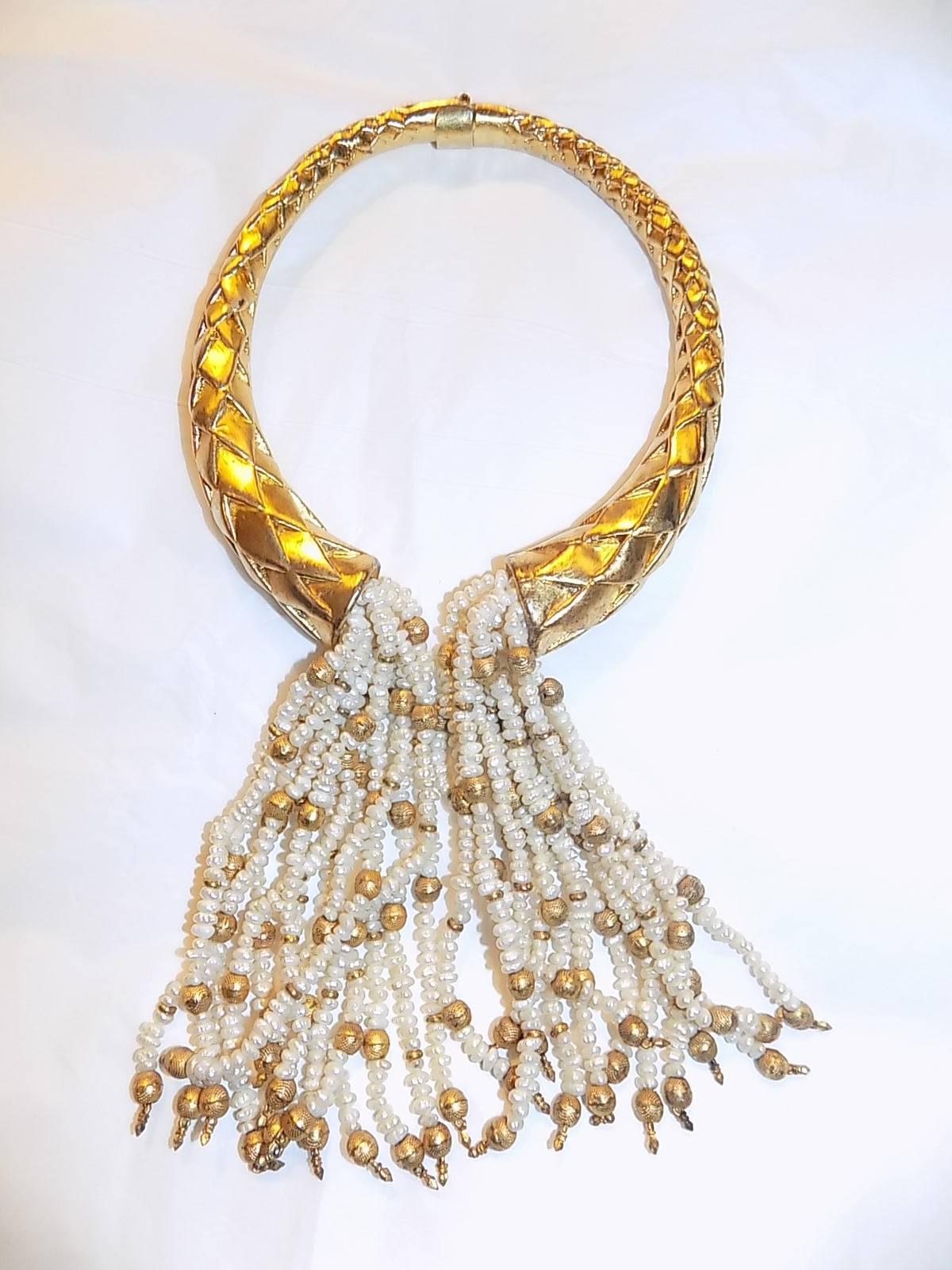 Spectacular massive vintage choker.  Amazing craftsmanship. Woven design on the sterling silver choker dipped in gold . 5 Inches long  clusters of pearls and gold beads falling down the front. tension  mechanism opening>. Solid sterling silver .