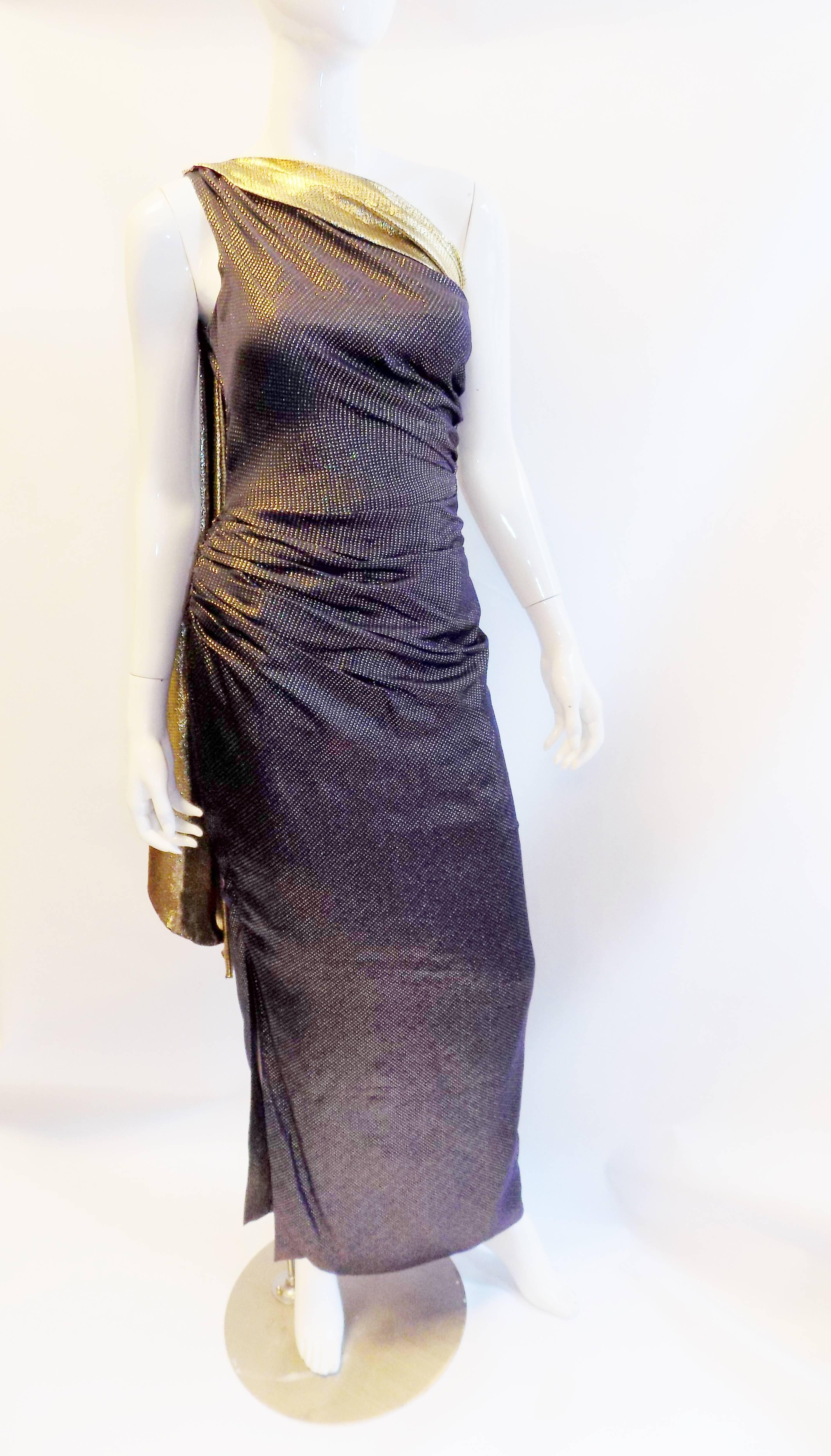 Spectacular Vicky Tiel Vintage Draped Goddess Lame dress . Gold and dark blue colors. Pristine condition. Size 3