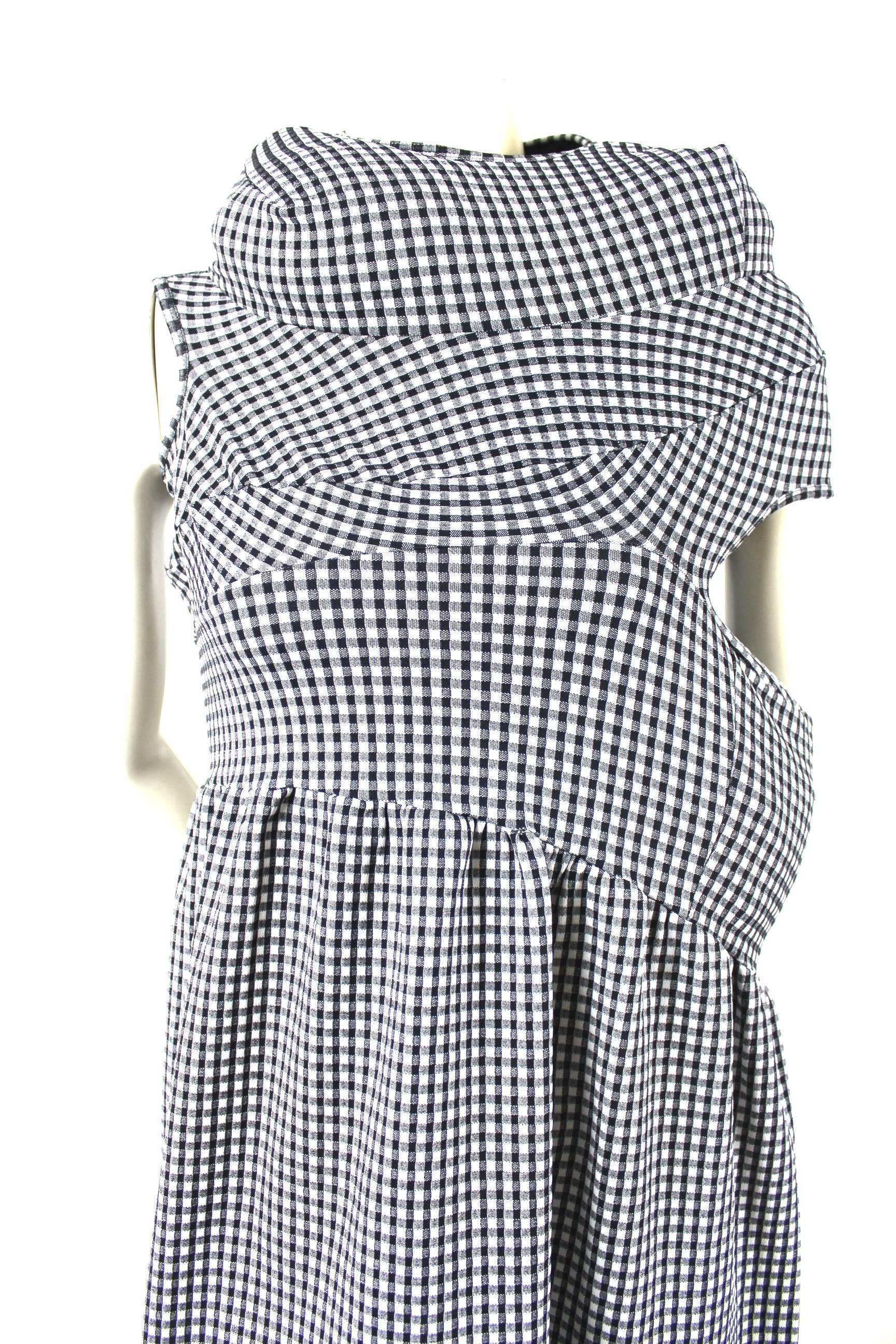 Comme des Garcons Body Meets Dress AD 1996
Robe de Chambre Label
Black and White Gingham Check
Dress is designed to be padded in various ways
