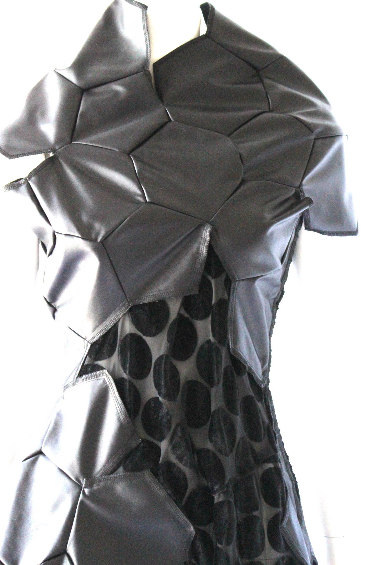 Comme des Garcons AD 2008 Runway Dress

Hexagonal patches create rounded football shape of bodice and skirt
Overlaid on large polka dot voided velvet dress

labelled size XS