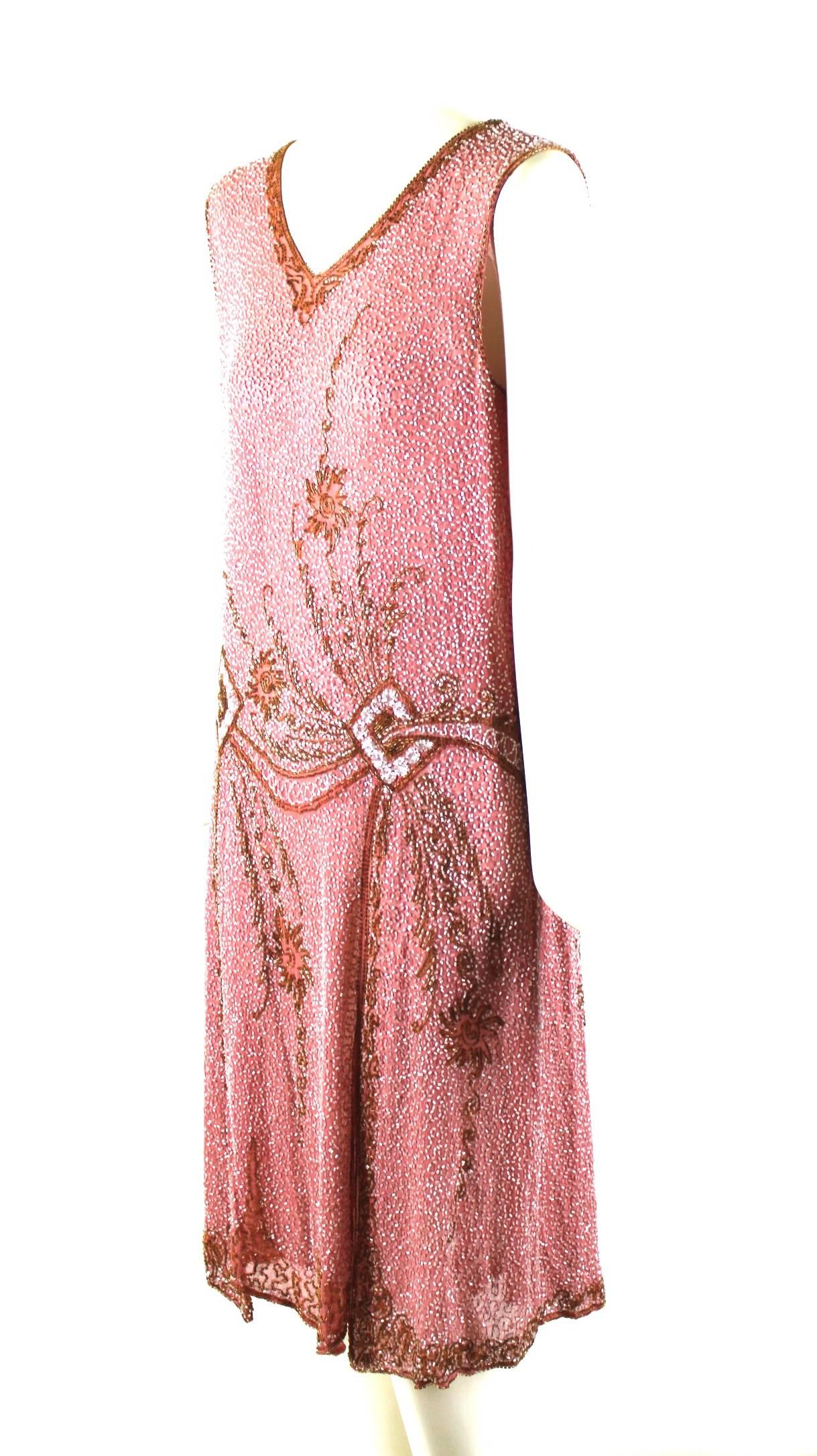 Pink Silk Heavily Beaded Flapper Dress
Elaborate beaded panels to skirt creating shaped hemline
Excellent Condition