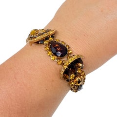 Splendido braccialetto di design vintage con strass color oro, ambra e citrino