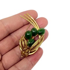 Vintage gold tone natural green jade cabochons flower brooch