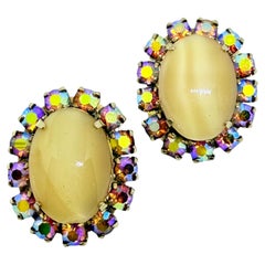 Pendientes de clip de diseño vintage con strass «aurora» de cristal en tono dorado