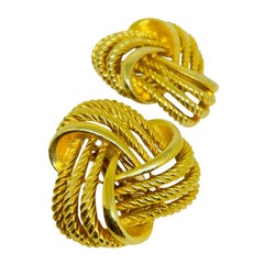 Vintage gold tone massive designer 80s clip on earring