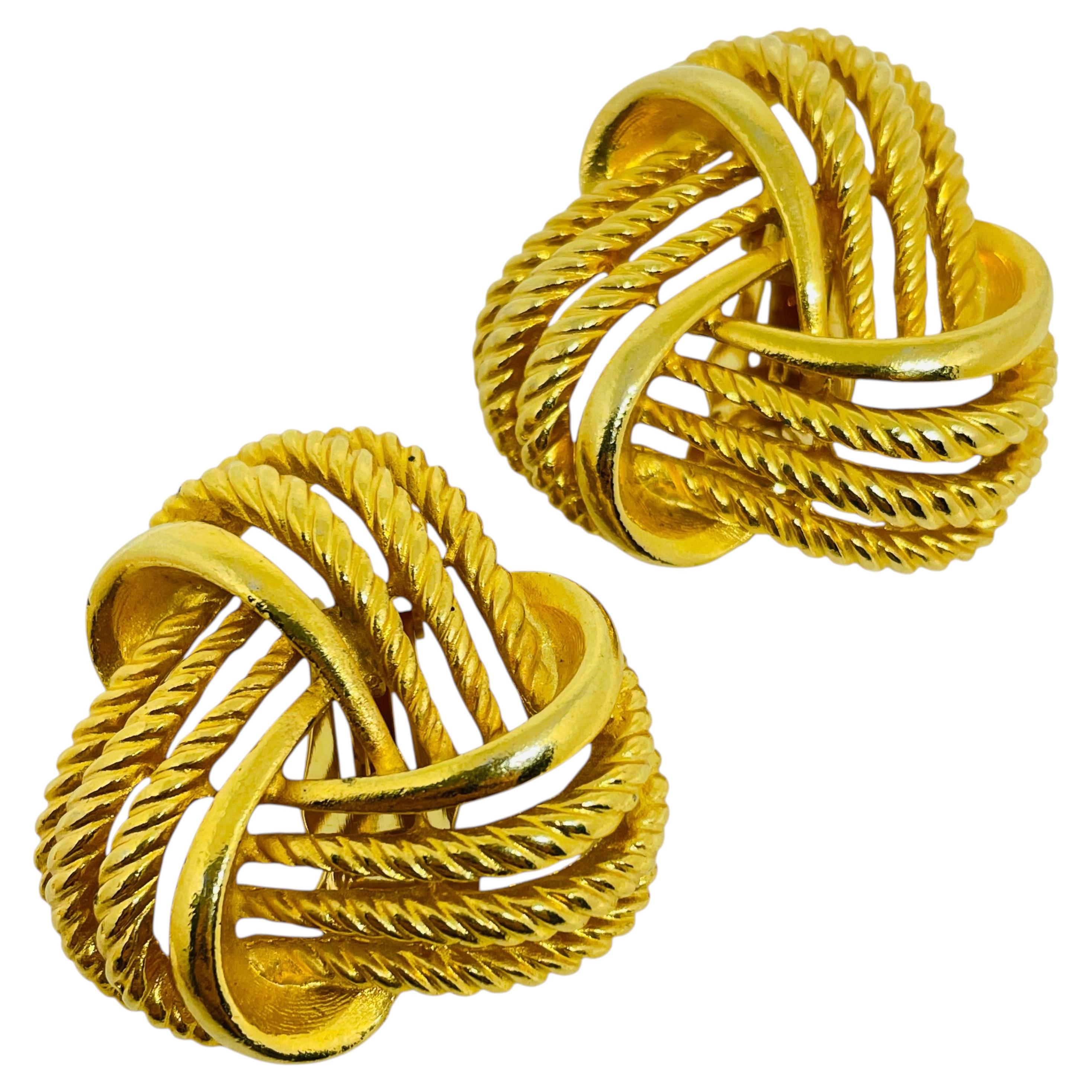 Vintage gold tone massive designer 80s clip on earring For Sale